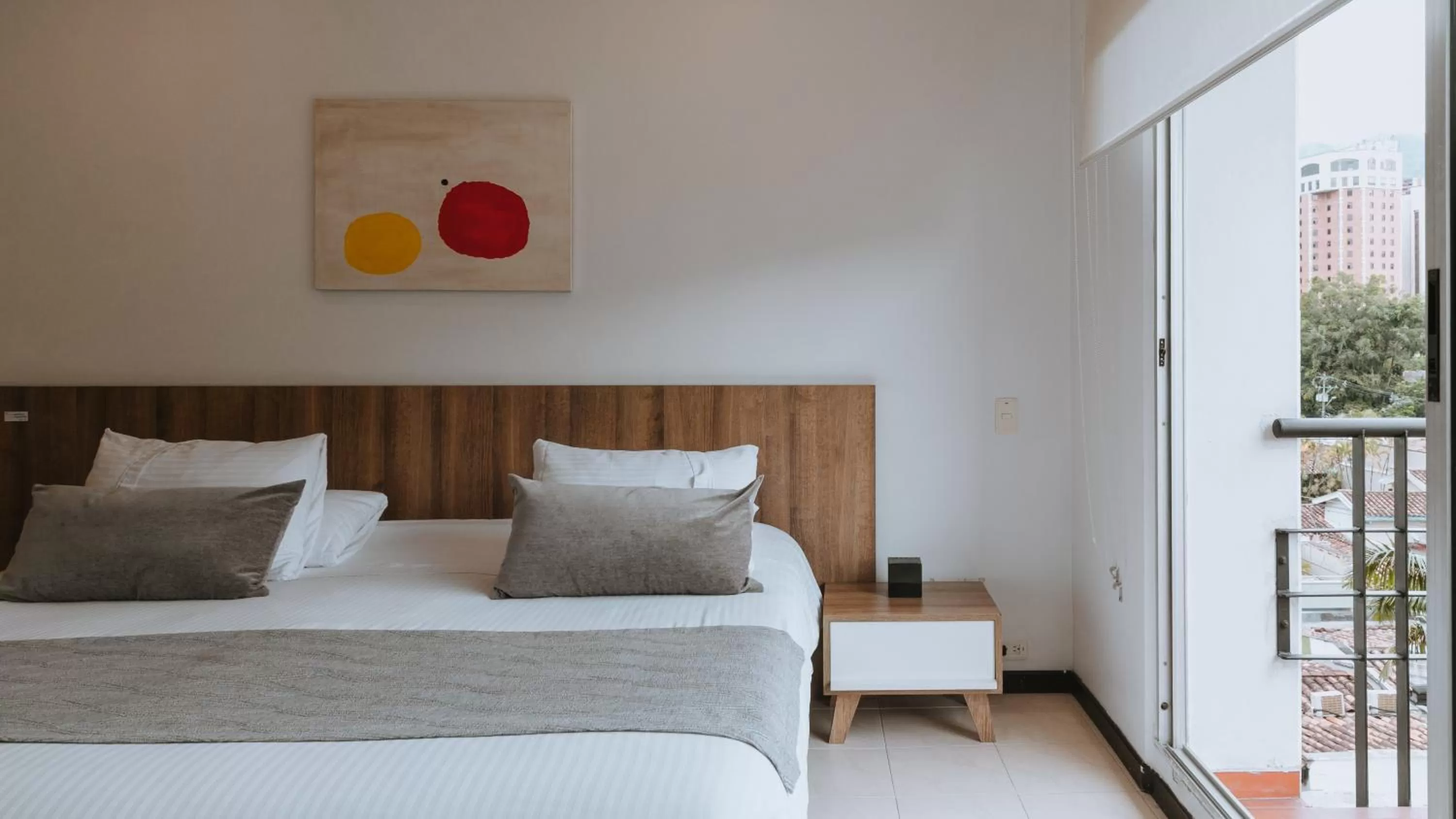 Bedroom, Bed in Travelers Orange Suites