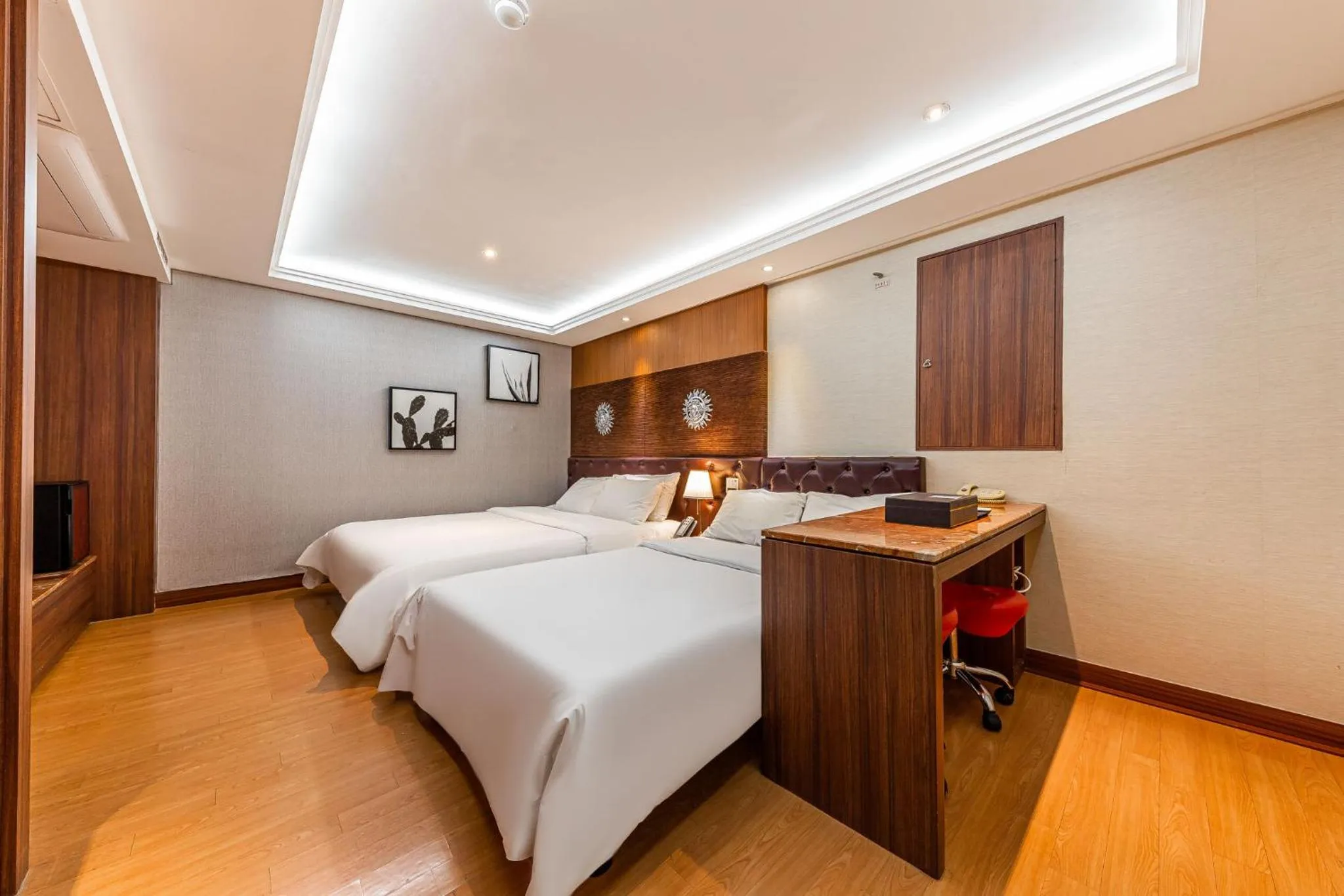Bed in Friendly DH Naissance Hotel by Mindrum Group