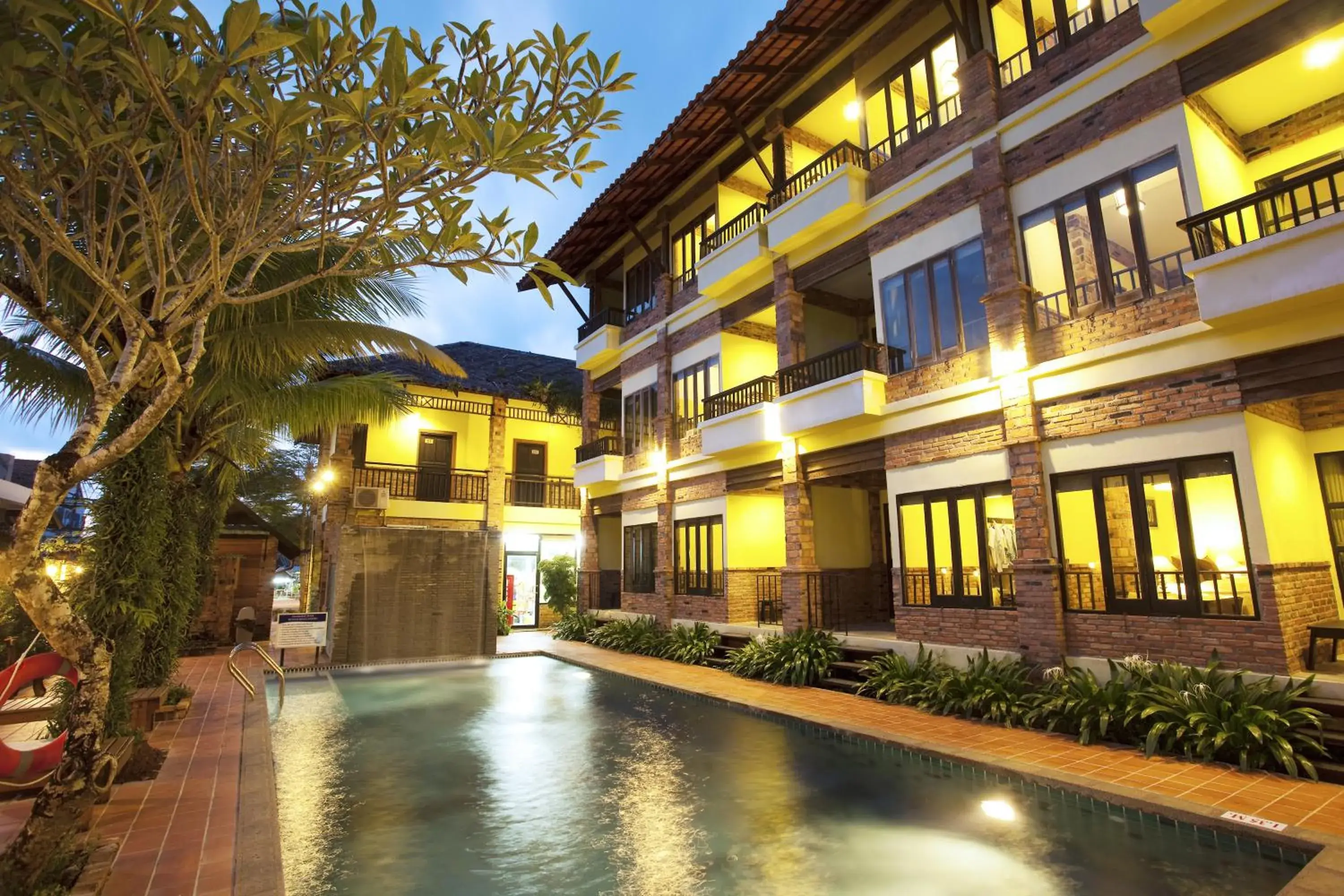 Pool view, Property Building in Motive Cottage Resort