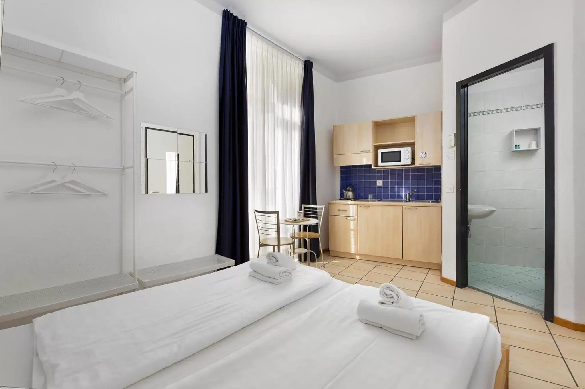 Bed in GuestHouse Lugano Center by LR