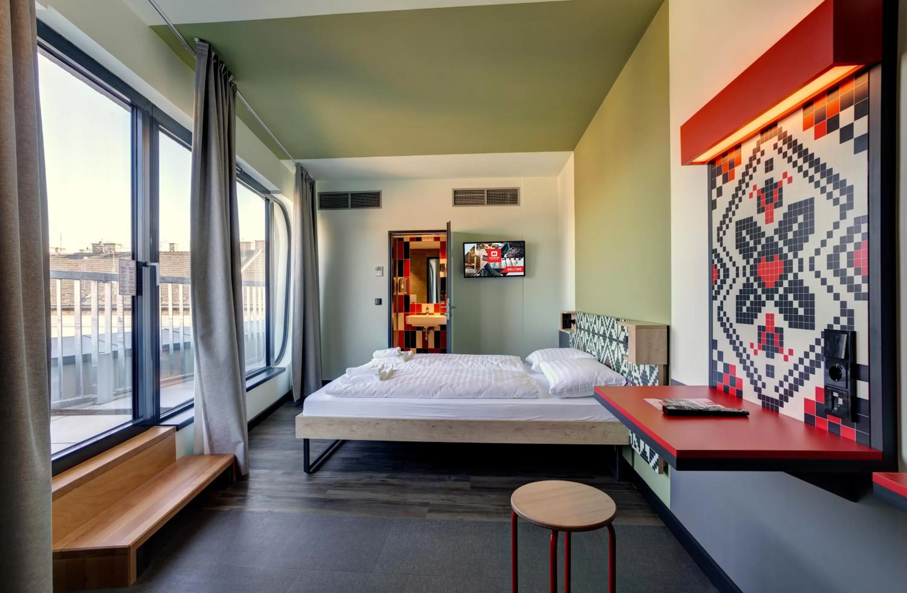 Photo of the whole room, Bed in MEININGER Budapest Great Market Hall