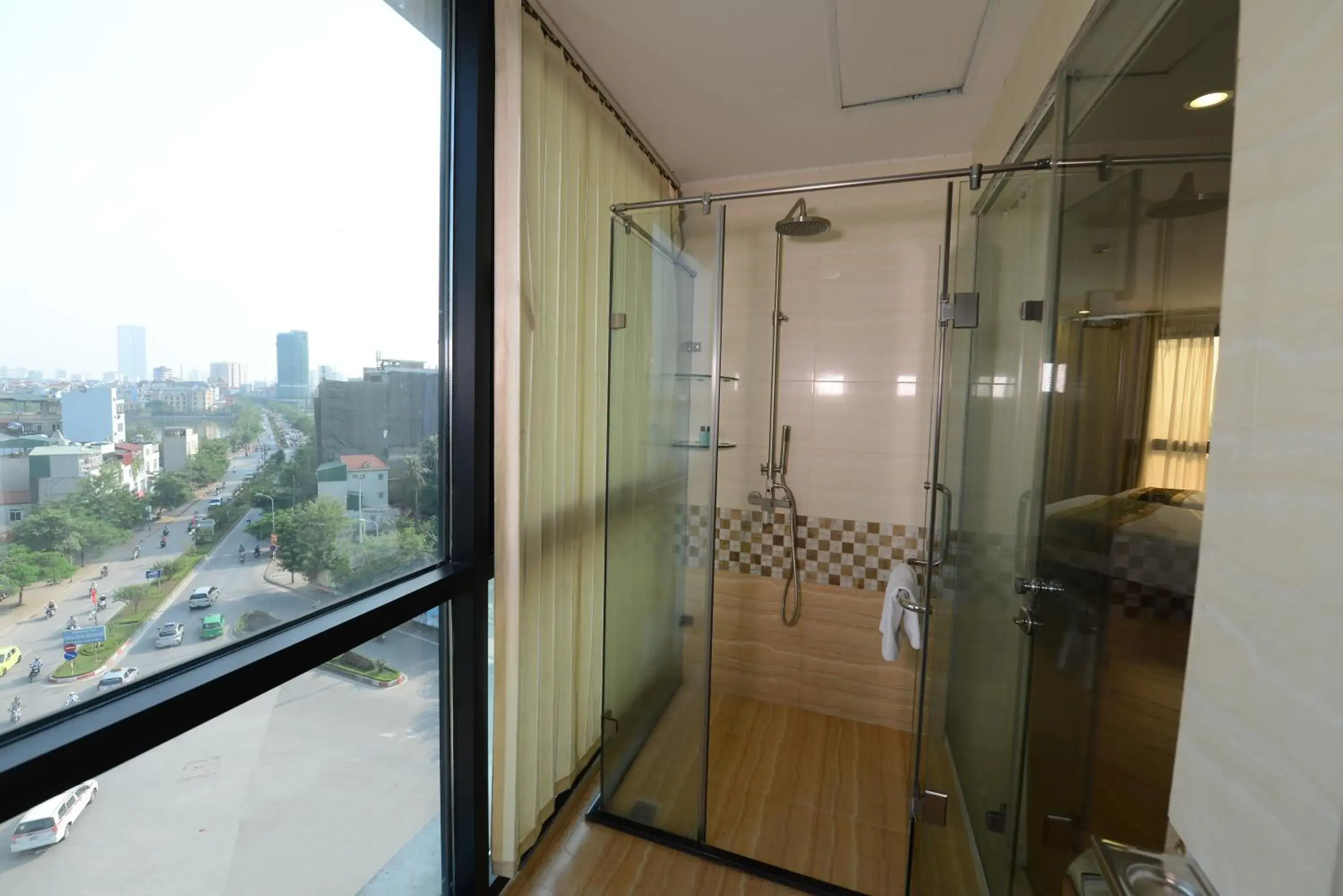 Shower in Sunset Westlake Hanoi Hotel