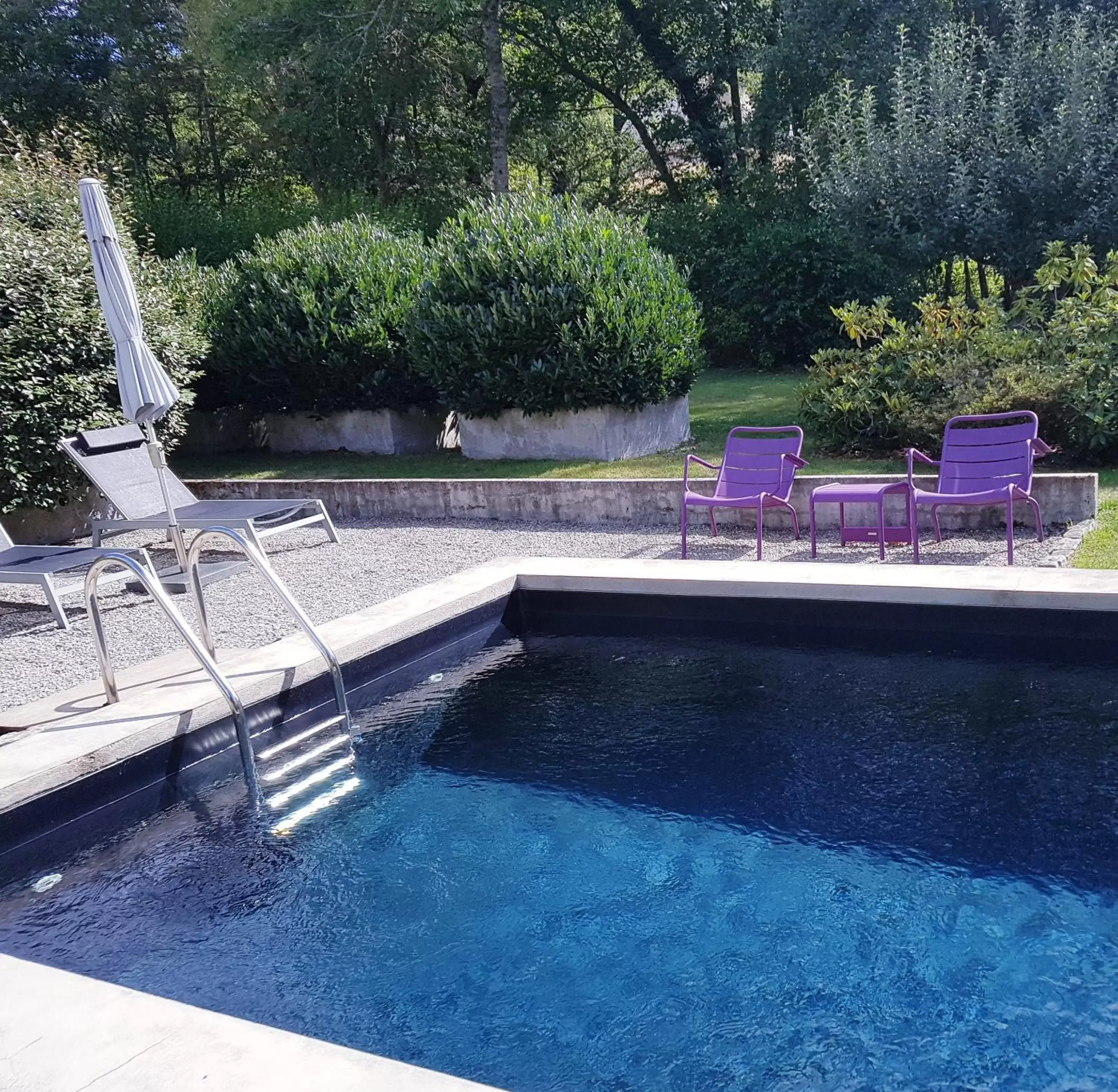 Communal lounge/ TV room, Swimming Pool in Moulin Renaudiots - Maison d'hôtes