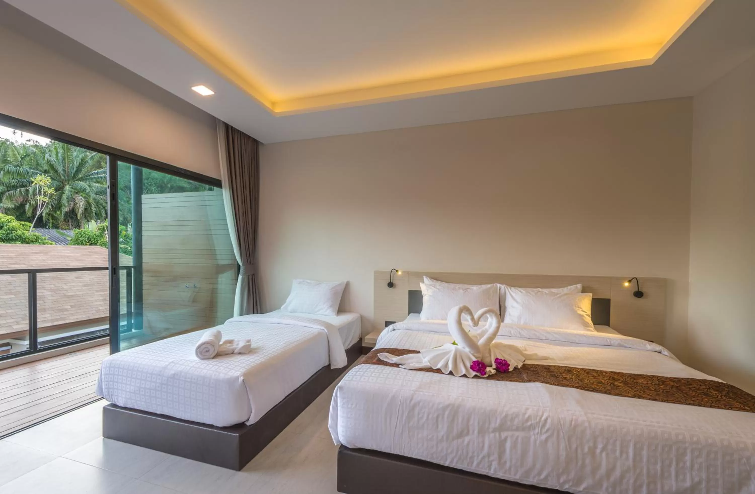 Bed in Cher​mantra​ Aonang​ Resort & Pool​ Suite