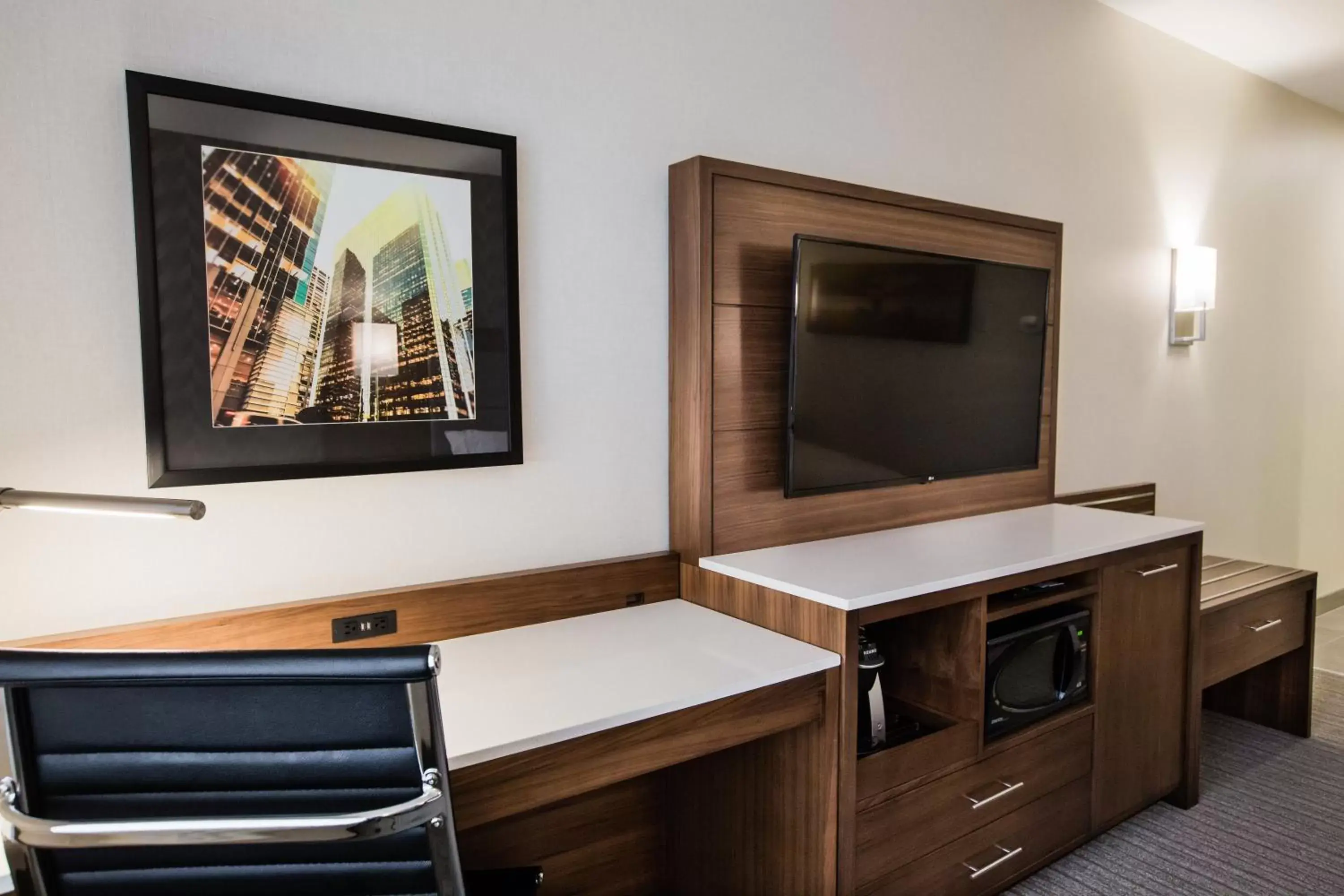 Photo of the whole room, TV/Entertainment Center in Holiday Inn Hotel & Suites Calgary South - Conference Ctr, an IHG Hotel