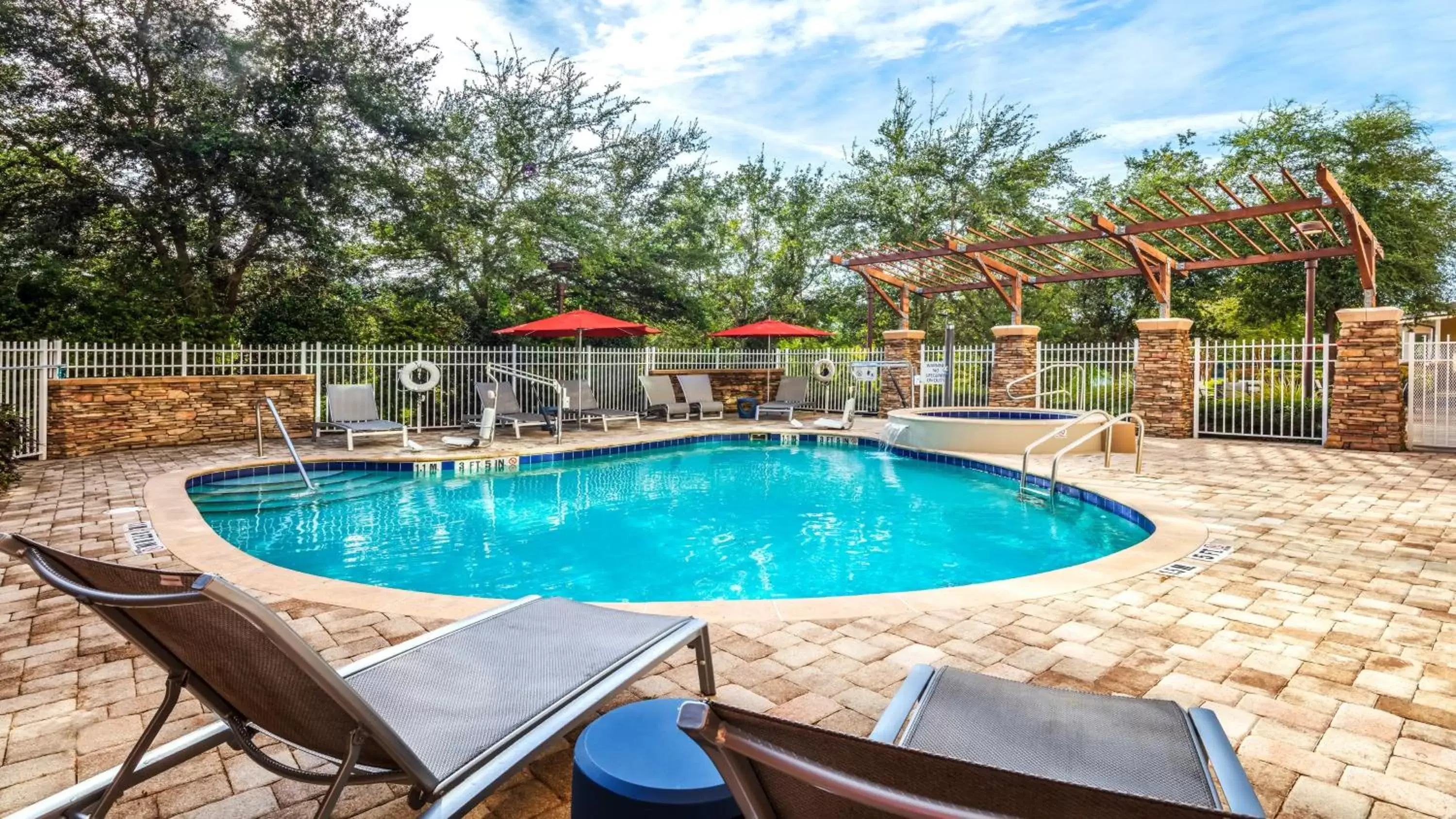 Swimming Pool in Hotel Indigo Jacksonville-Deerwood Park, an IHG Hotel