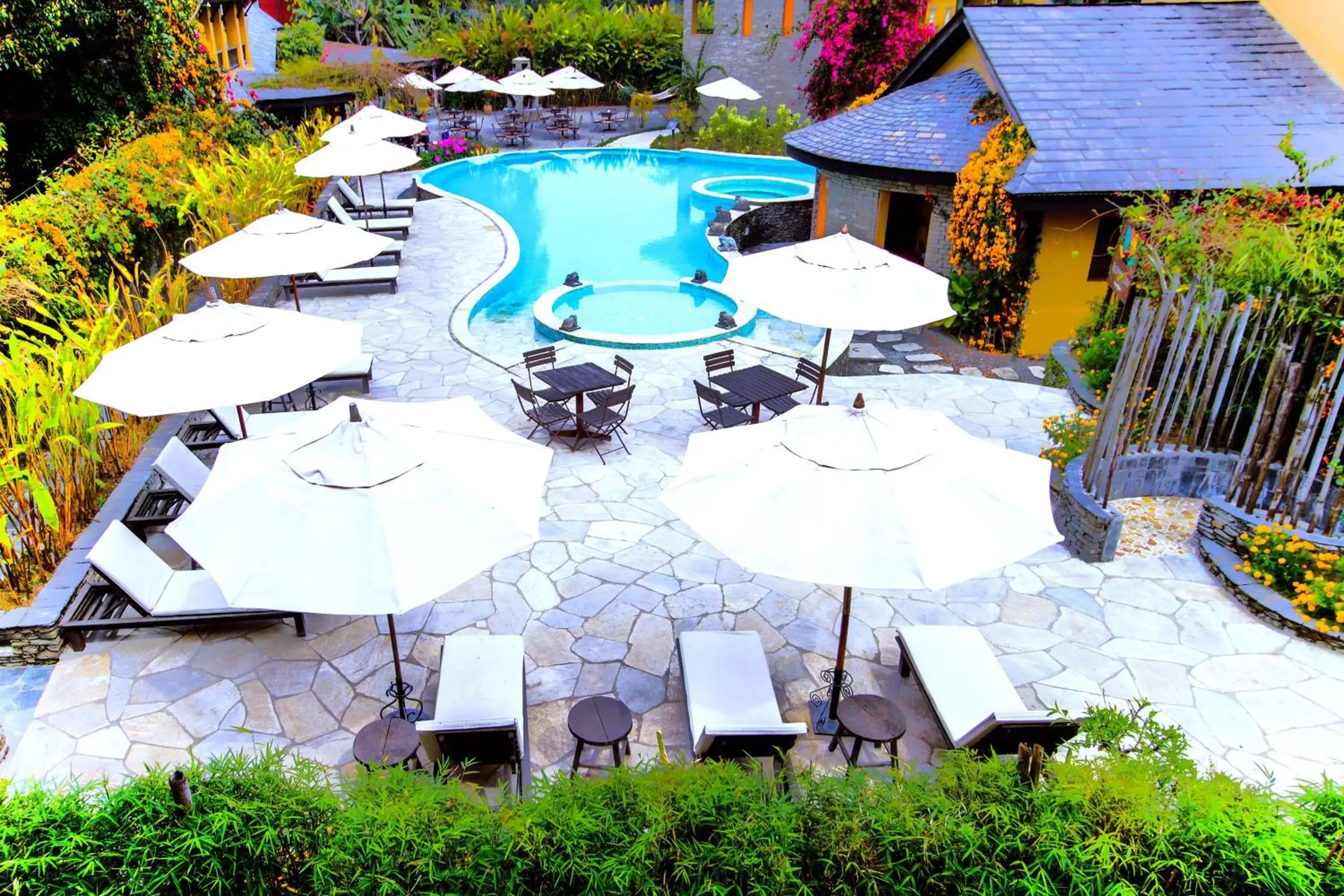 Patio, Pool View in Temple Tree Resort & Spa