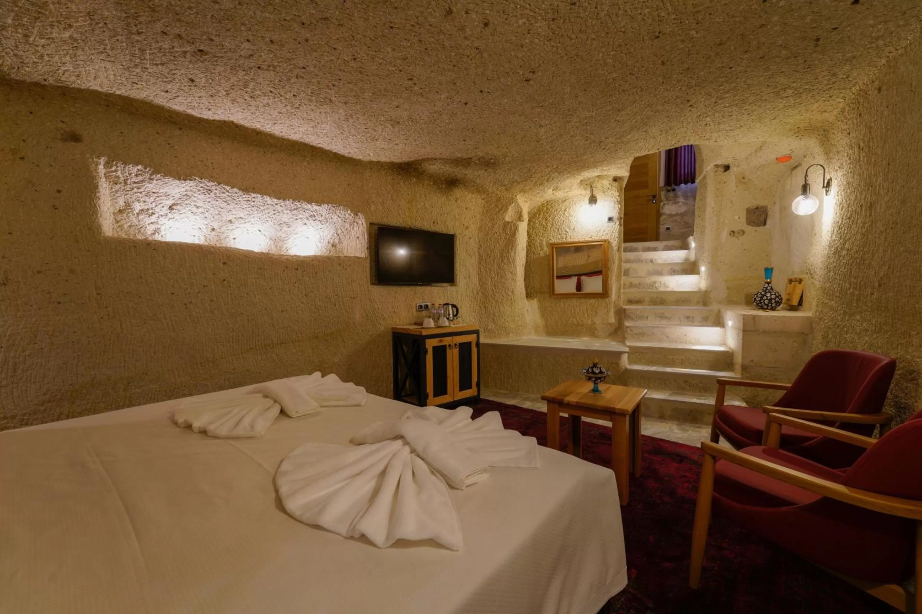 Bed in The Niche Cave Hotel