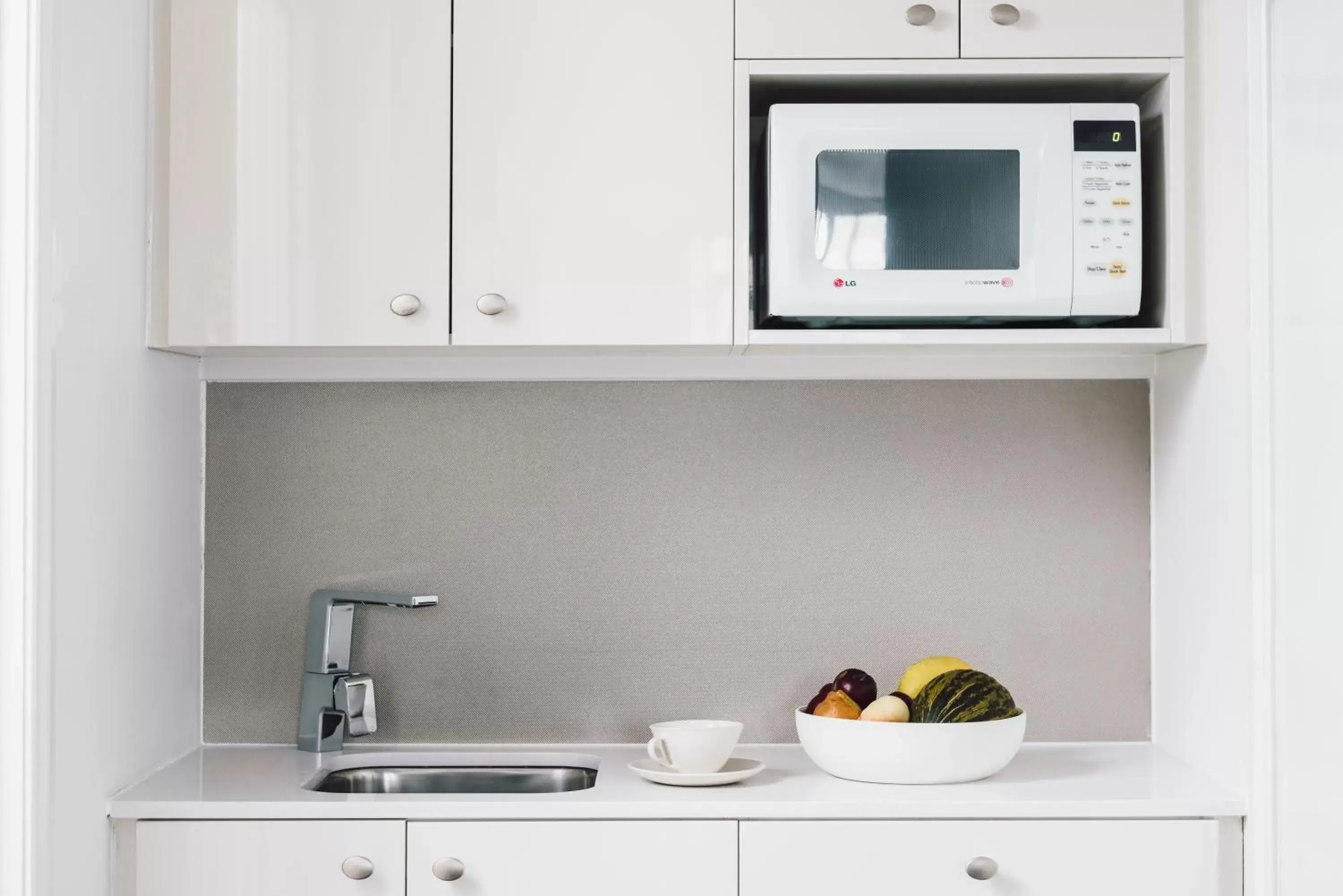 Kitchen or kitchenette, Kitchen/Kitchenette in Quay West Suites Melbourne