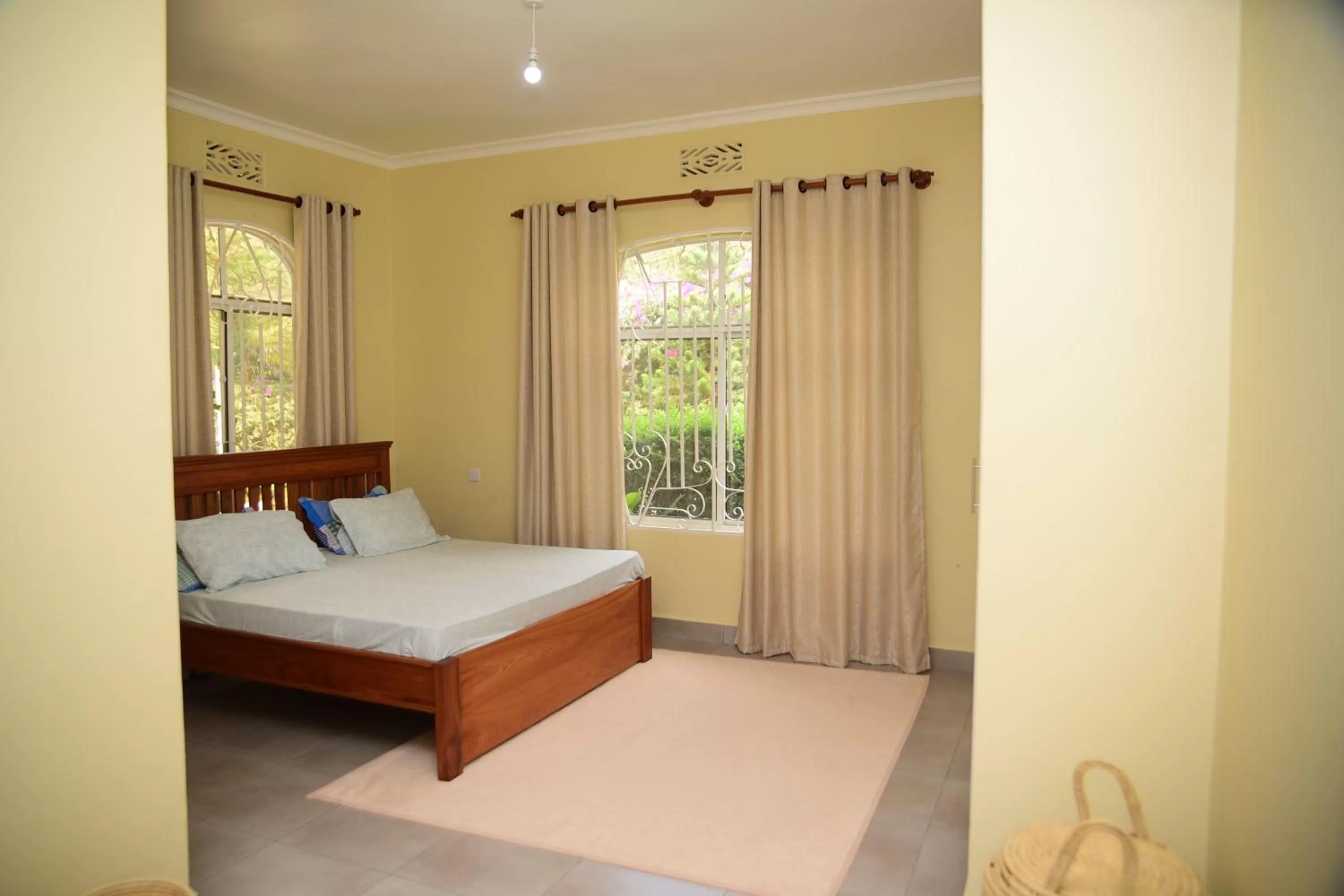 Bed in Charming Eco-Homestay near Kilimanjaro International Airport