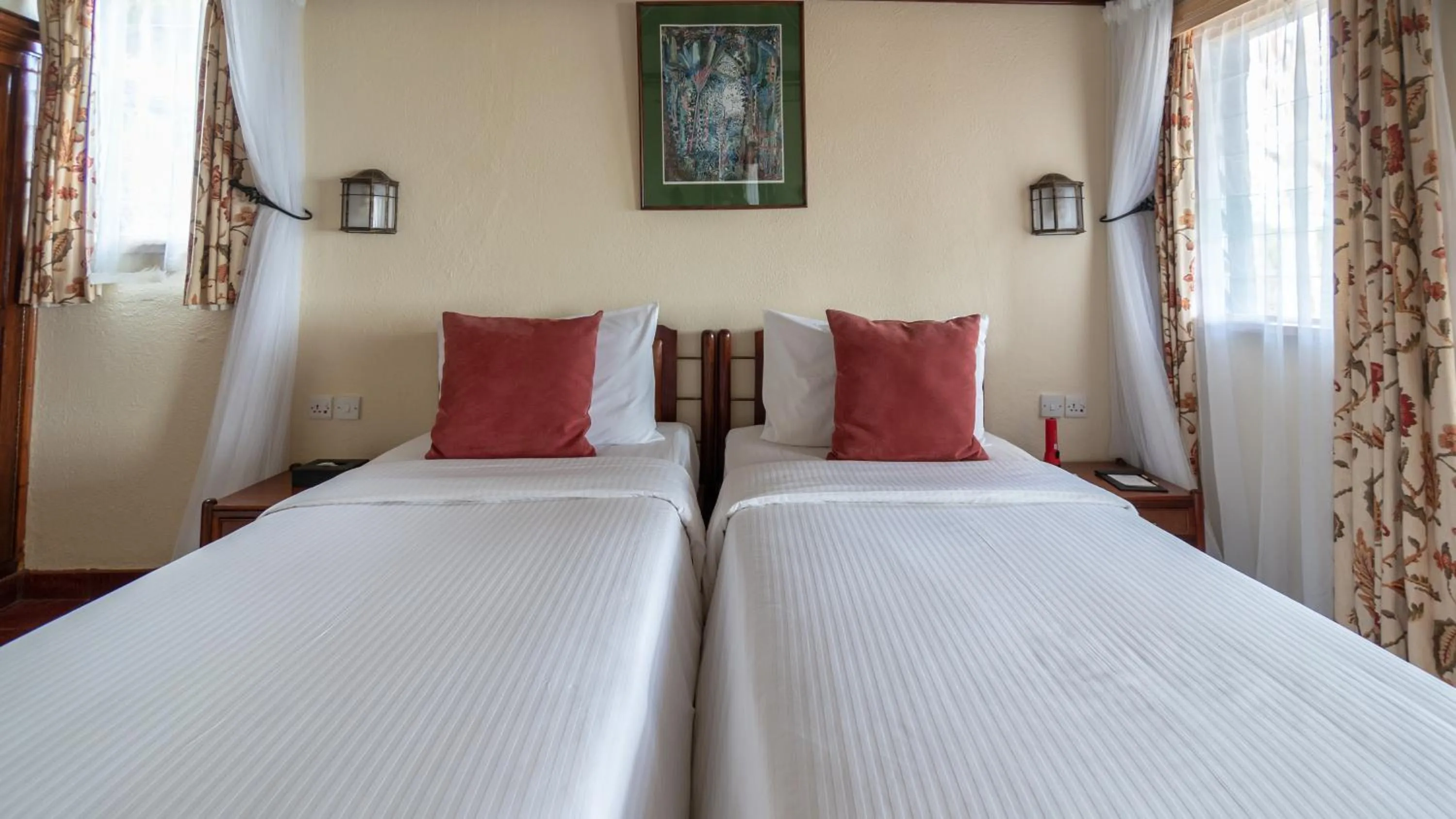 Bed in Sarova Lion Hill Game Lodge