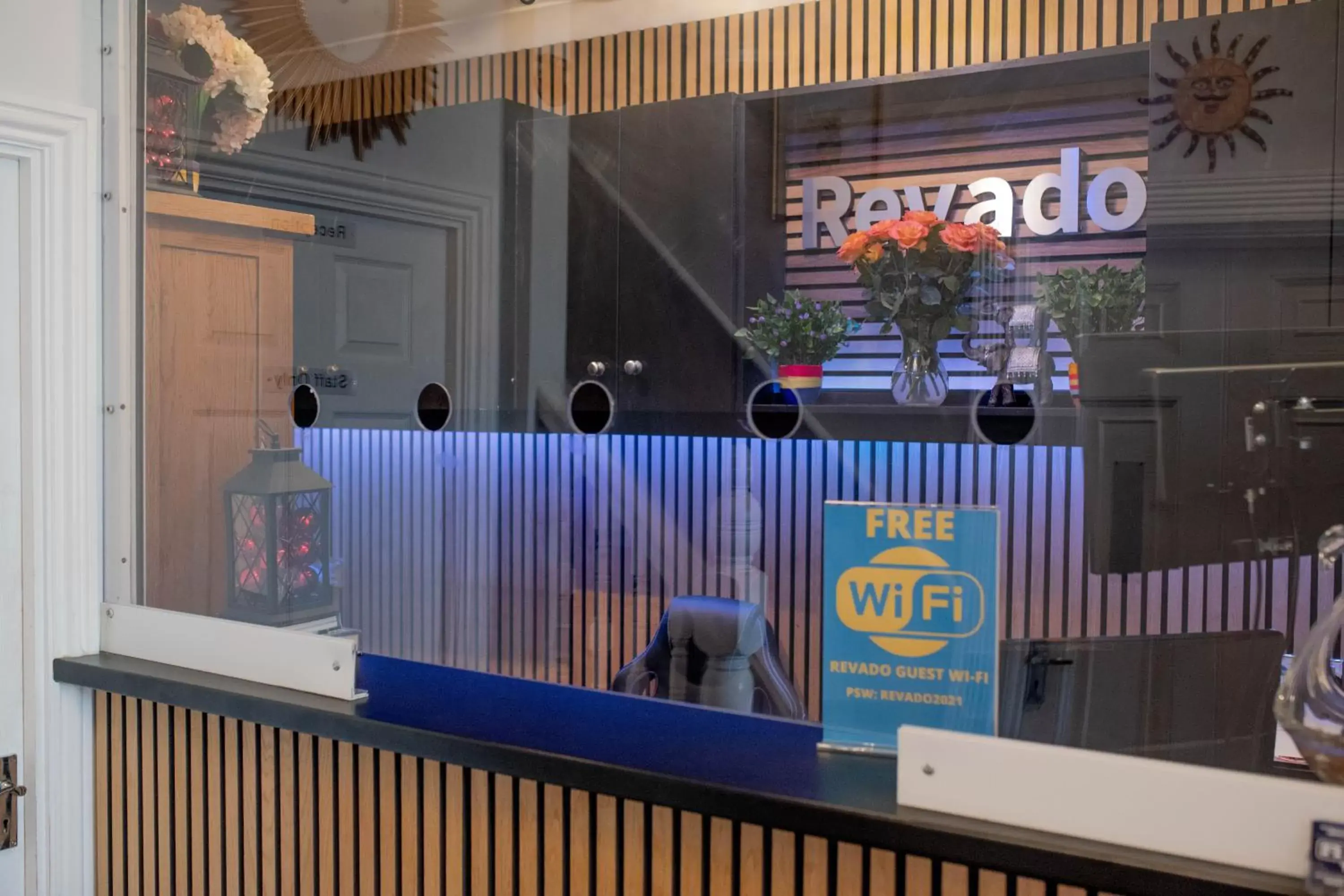 Lobby or reception in Revado Hotel