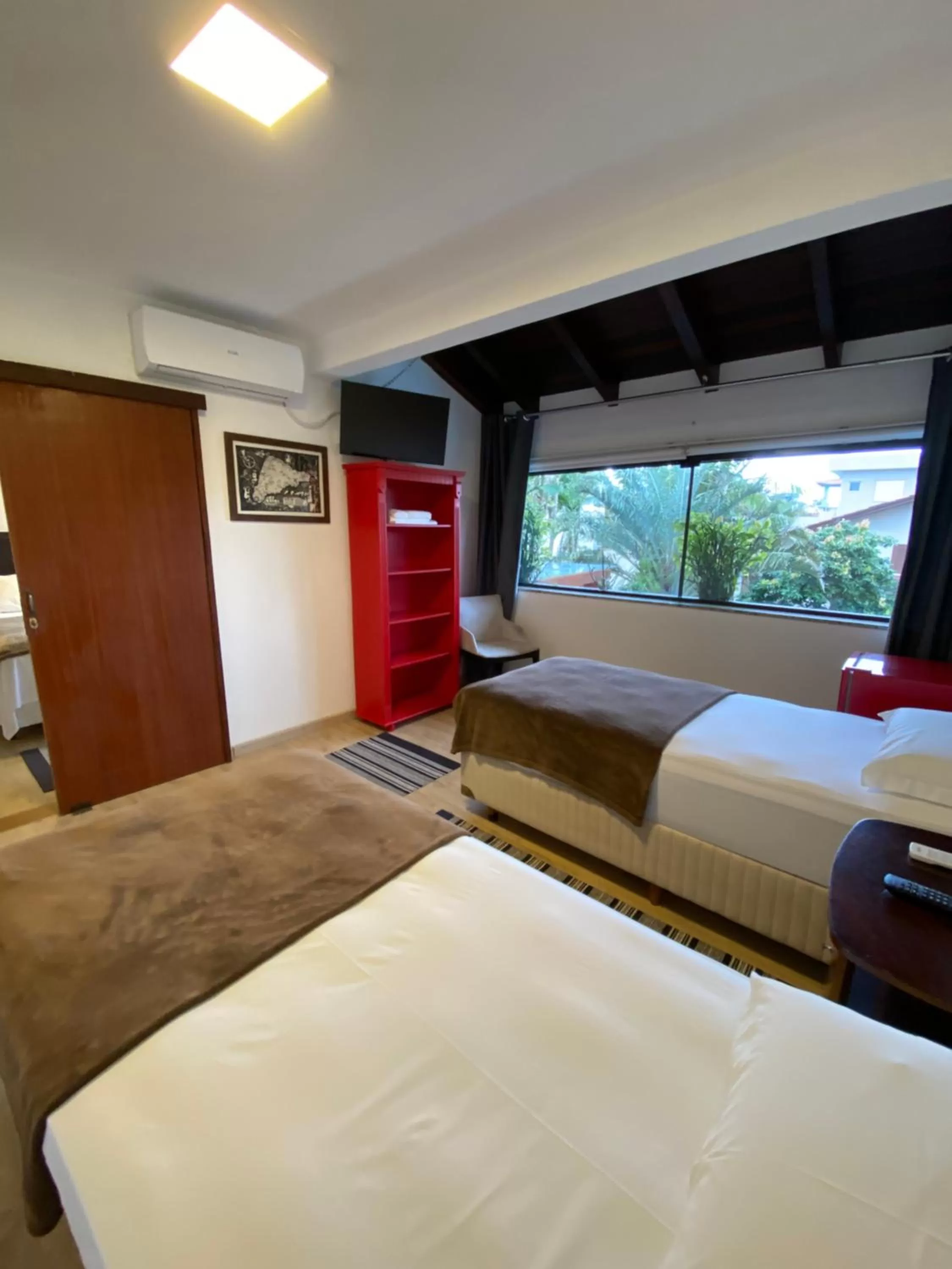 Bed in Pousada Casa da Praia