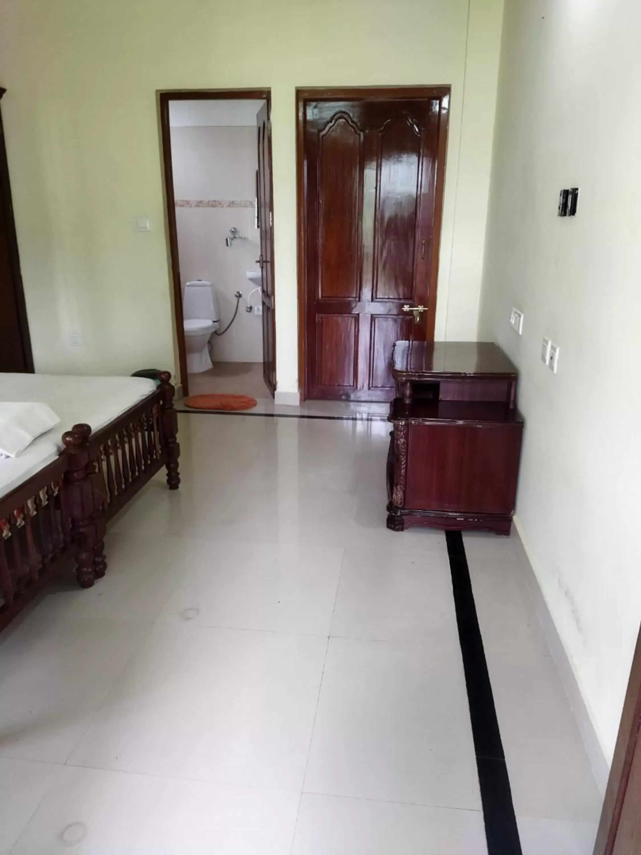 Bed in Sree Mookambika Beach Resort Bed in Sree Mookambika Beach Resort