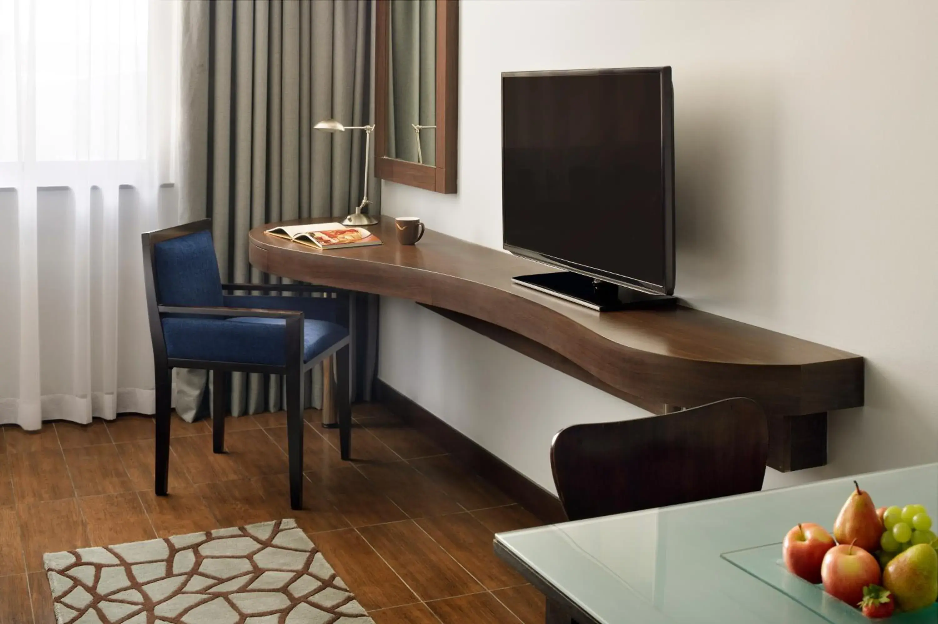 TV and multimedia, TV/Entertainment Center in Moevenpick Hotel Apartments The Square