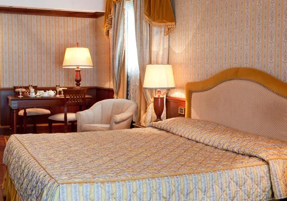 Bed in Grand Hotel Dino