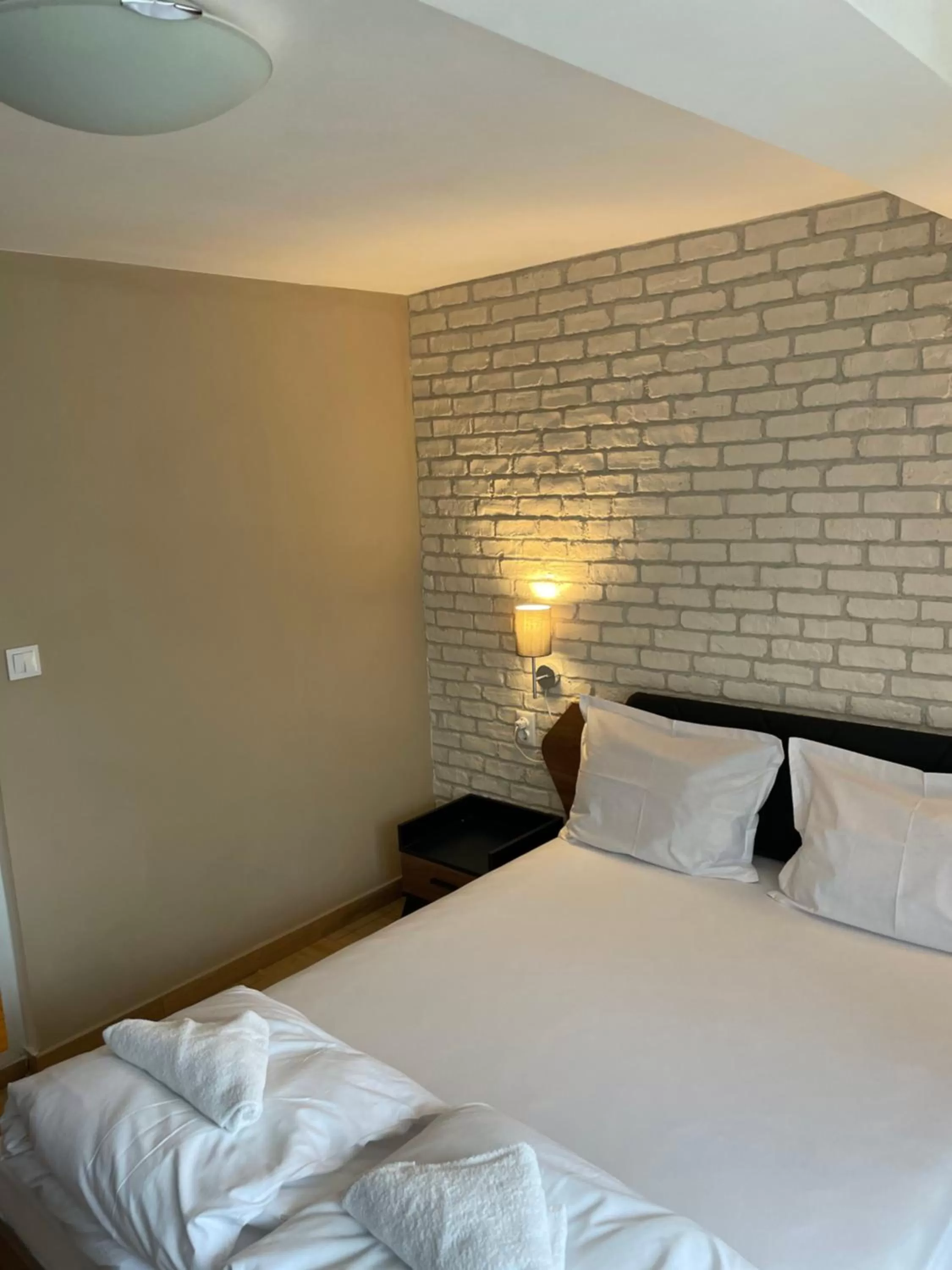 Bed in Family Hotel Malibu