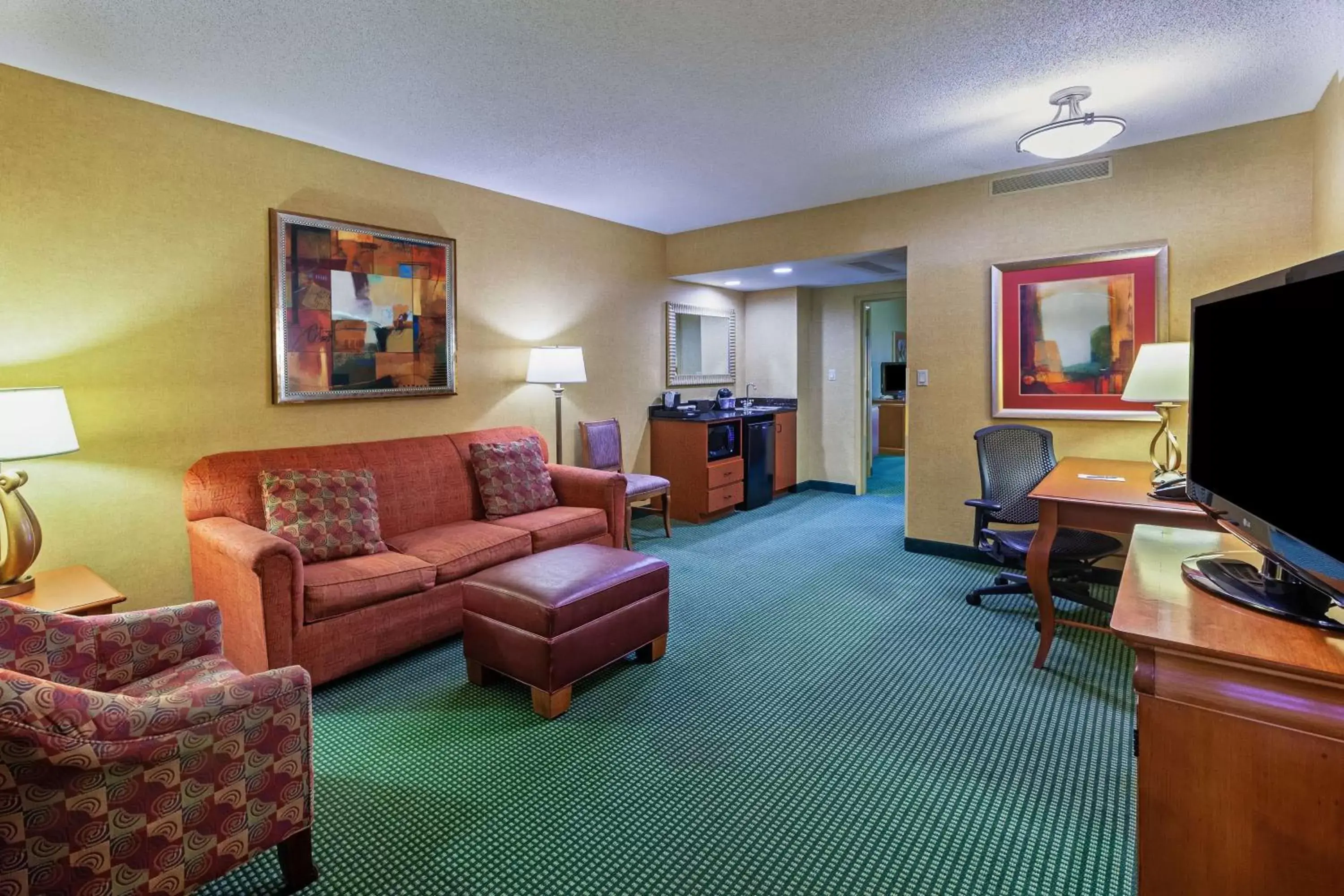 Bedroom, Seating Area in Embassy Suites by Hilton Greensboro Airport