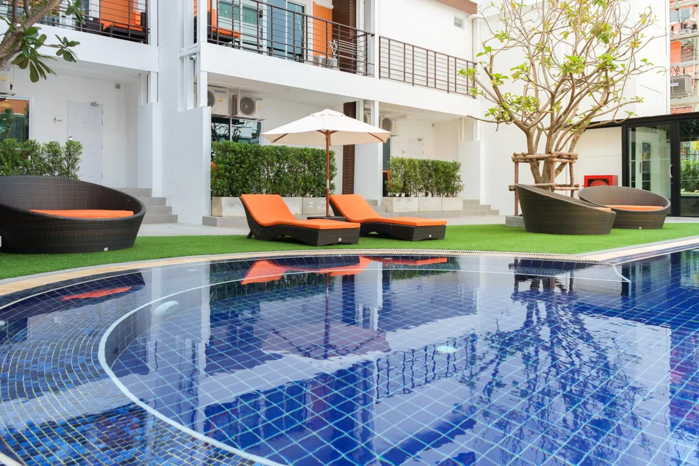 Balcony/Terrace, Swimming Pool in FX Hotel Pattaya