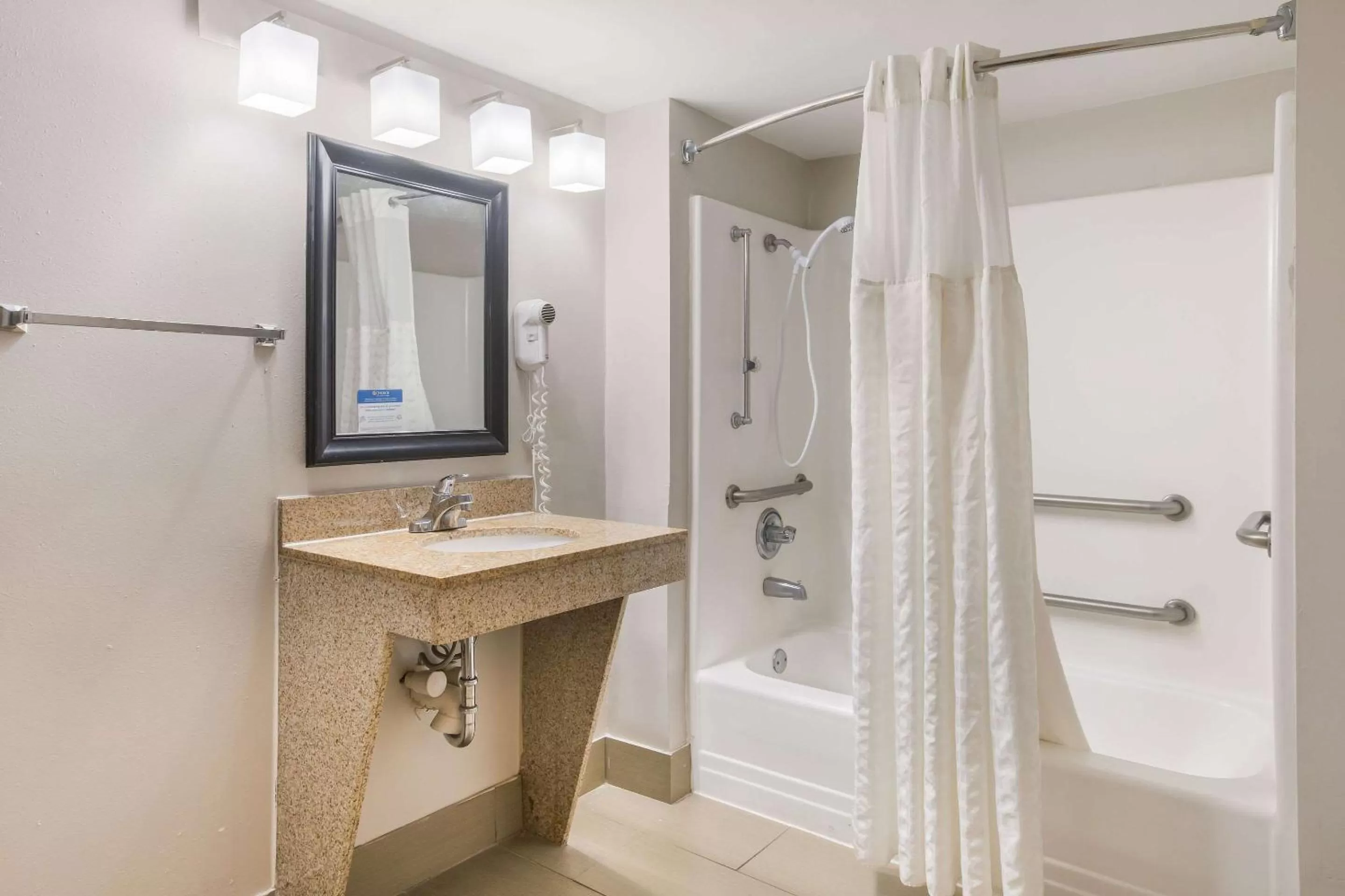 Bedroom in Clarion Pointe Forsyth I-75