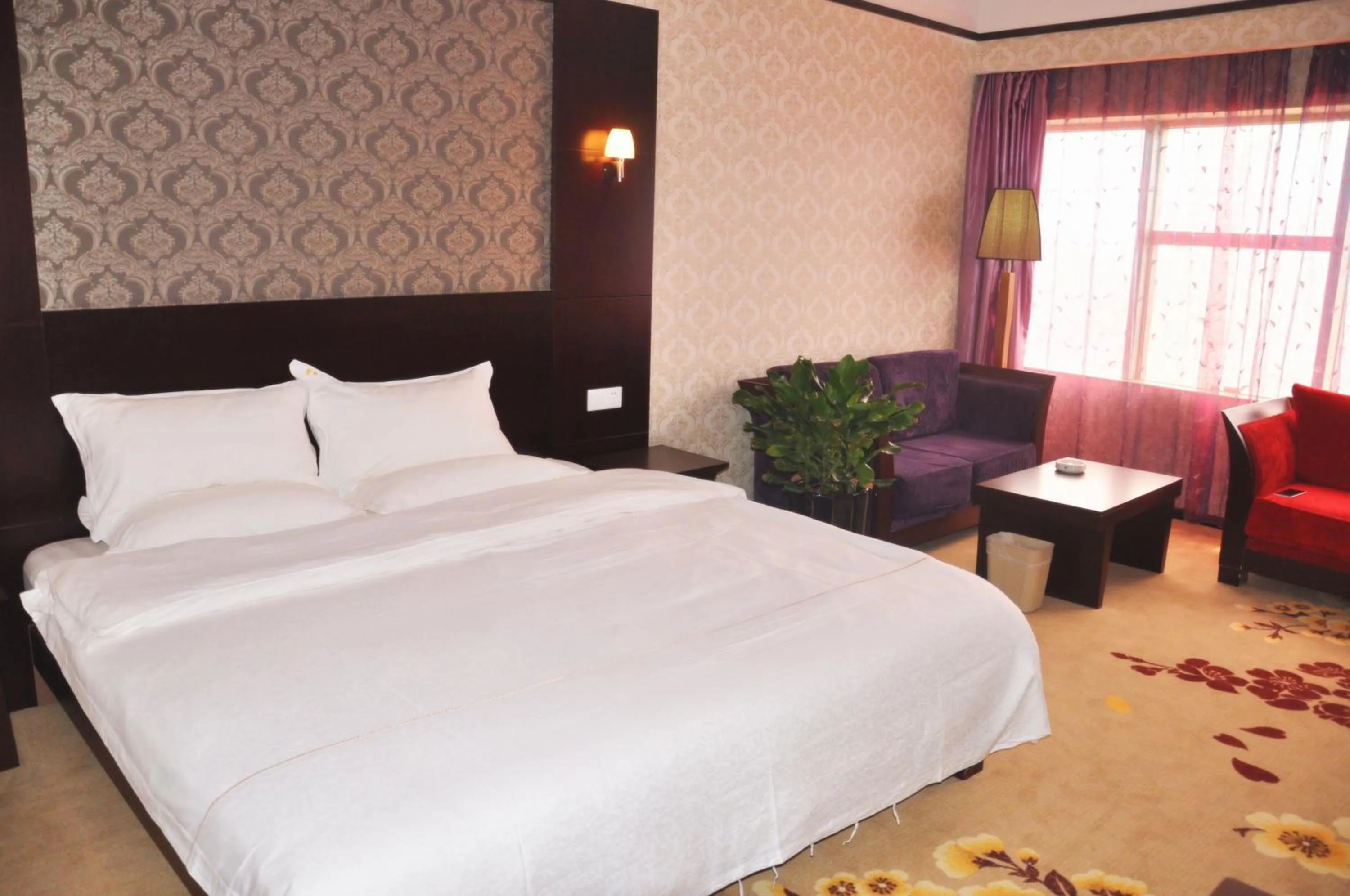 Bed in Da Zhen Hotel (Previously: Qian Lv Chen Hotel Da Zhen)
