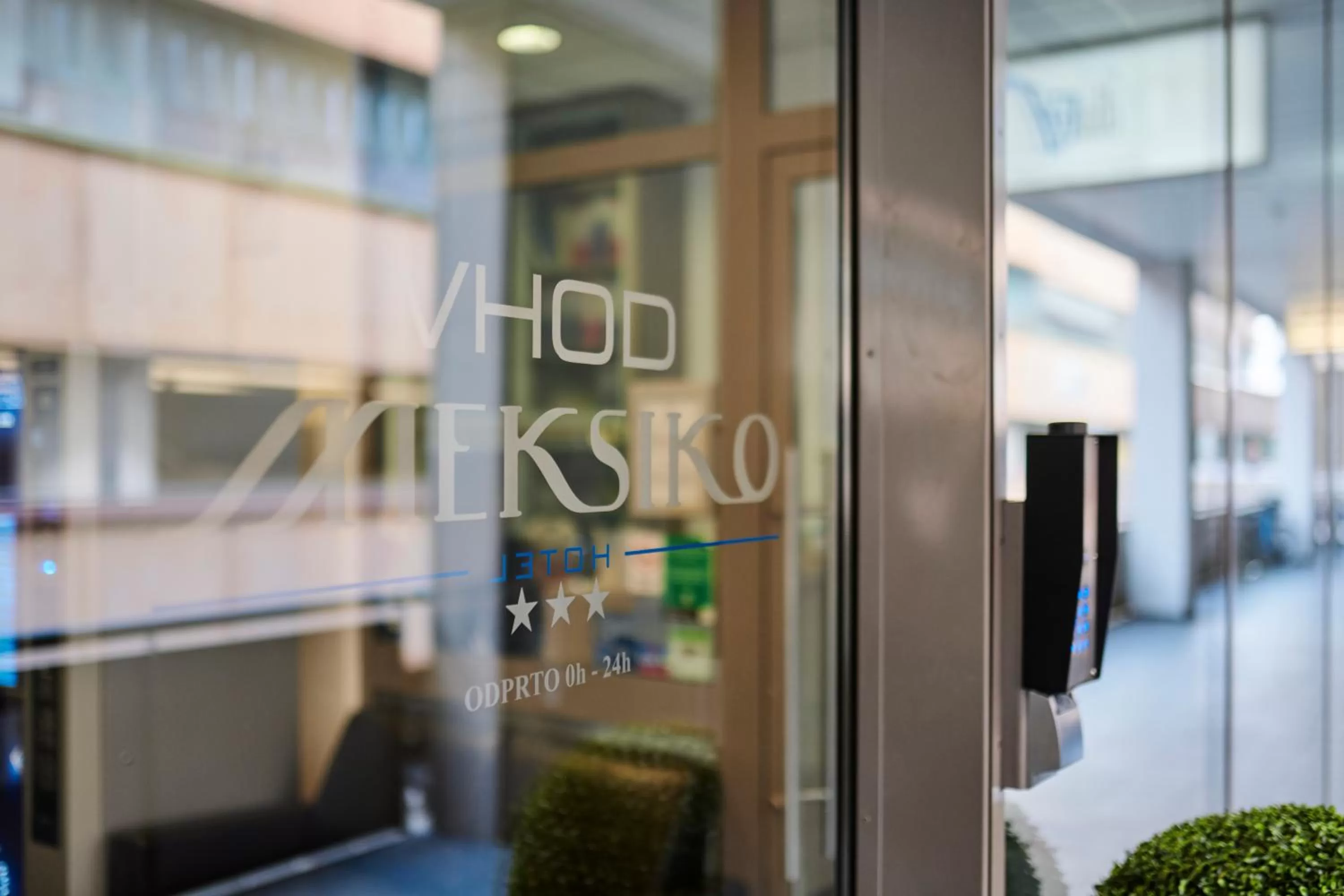 Property logo or sign in Hotel Meksiko