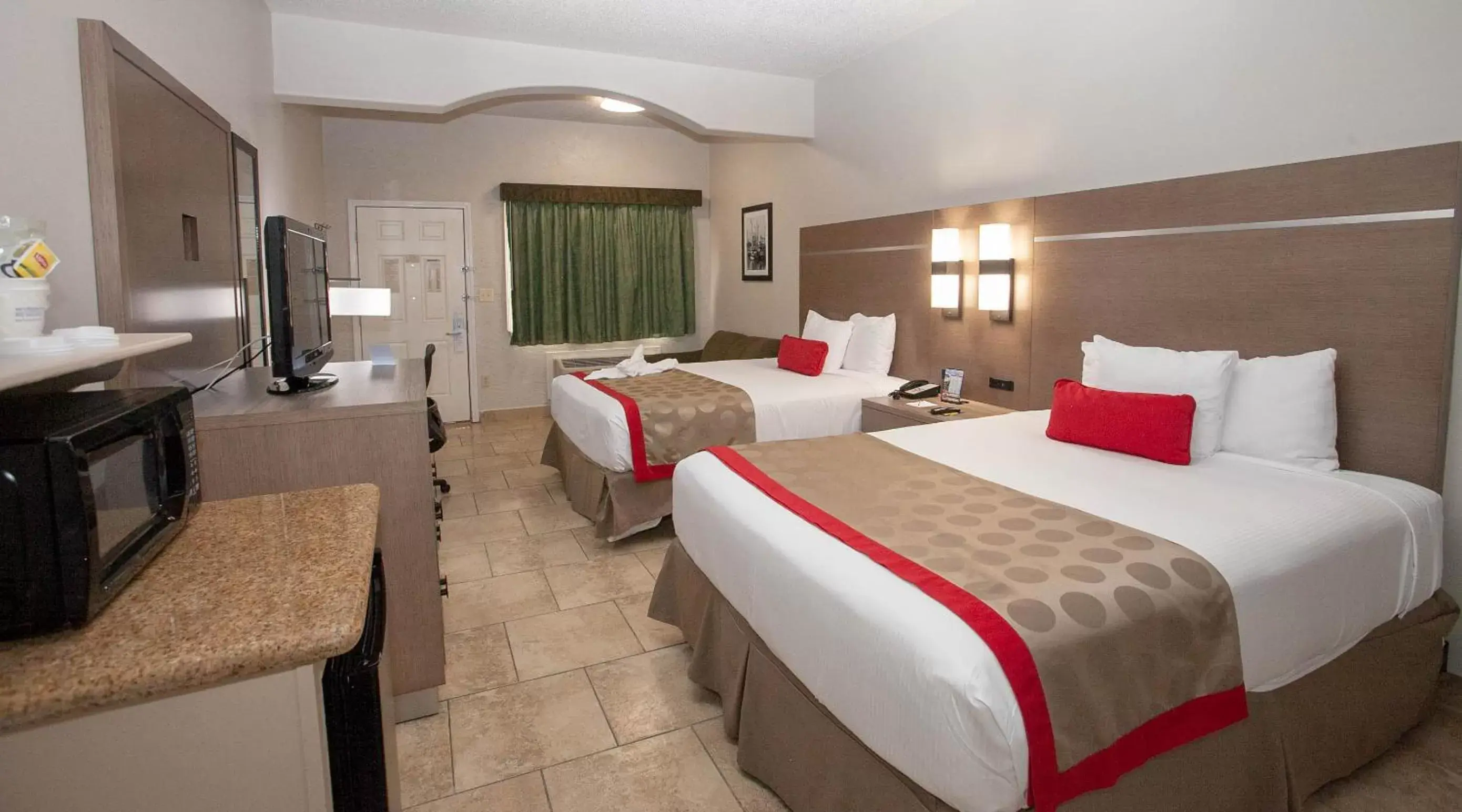 Bed in Ramada by Wyndham & Suites South Padre Island Bed in Ramada by Wyndham & Suites South Padre Island