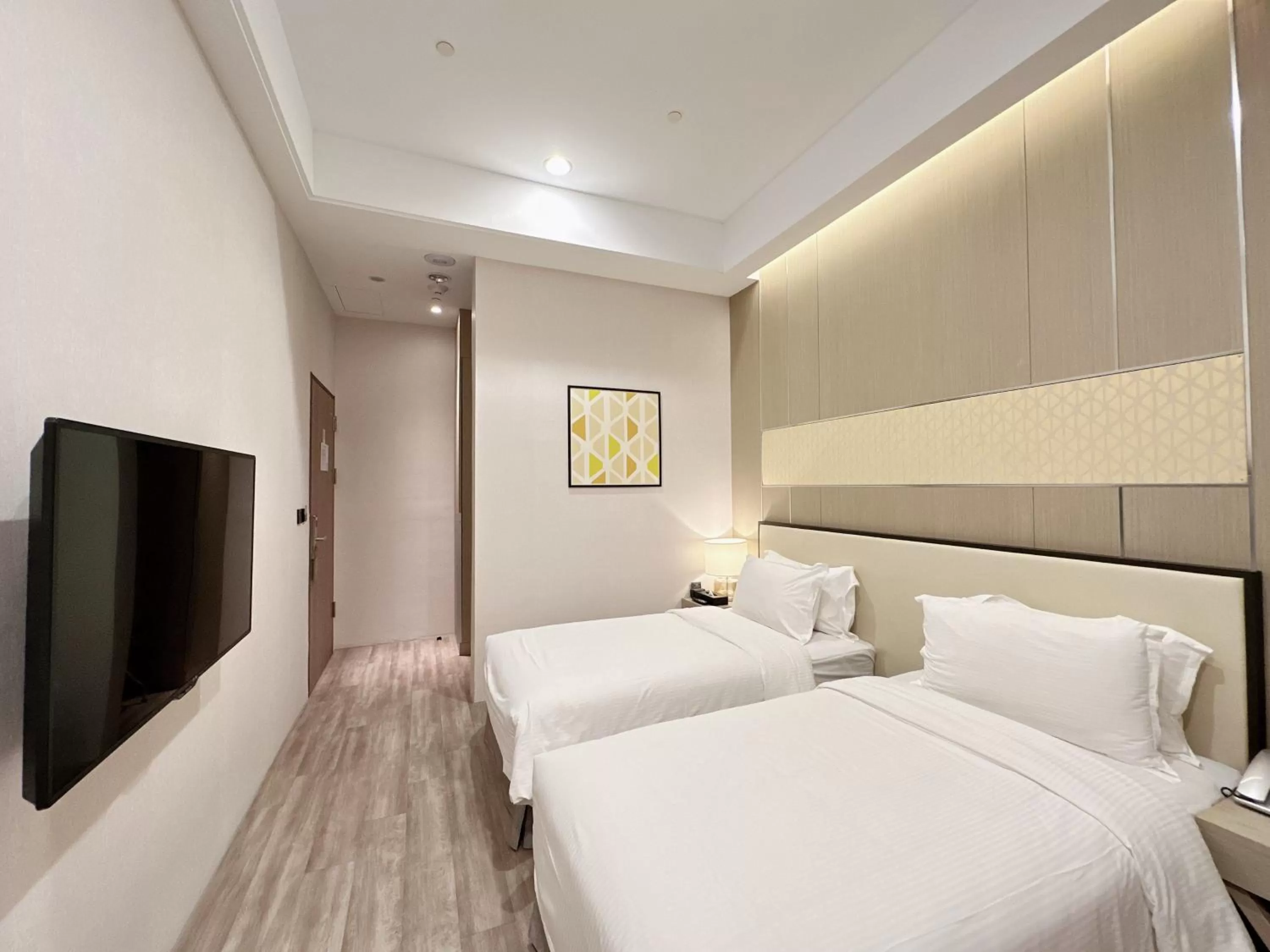 Bed in 台南星鑽國際商旅 Hua Hotel