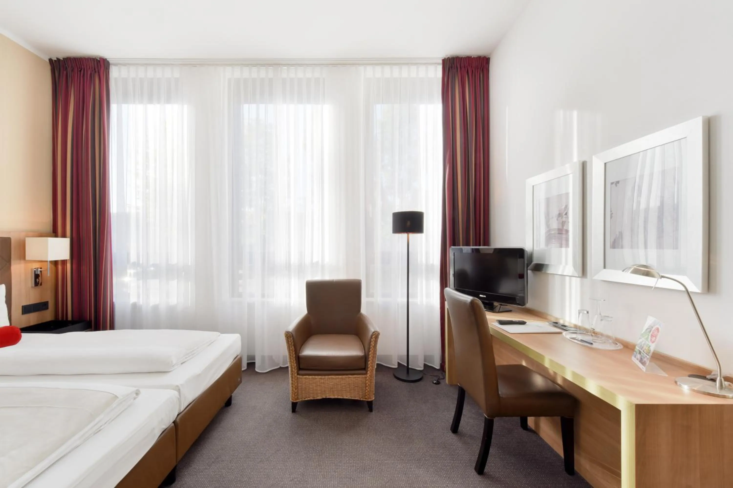 Photo of the whole room, Bed in ACHAT Hotel München Süd
