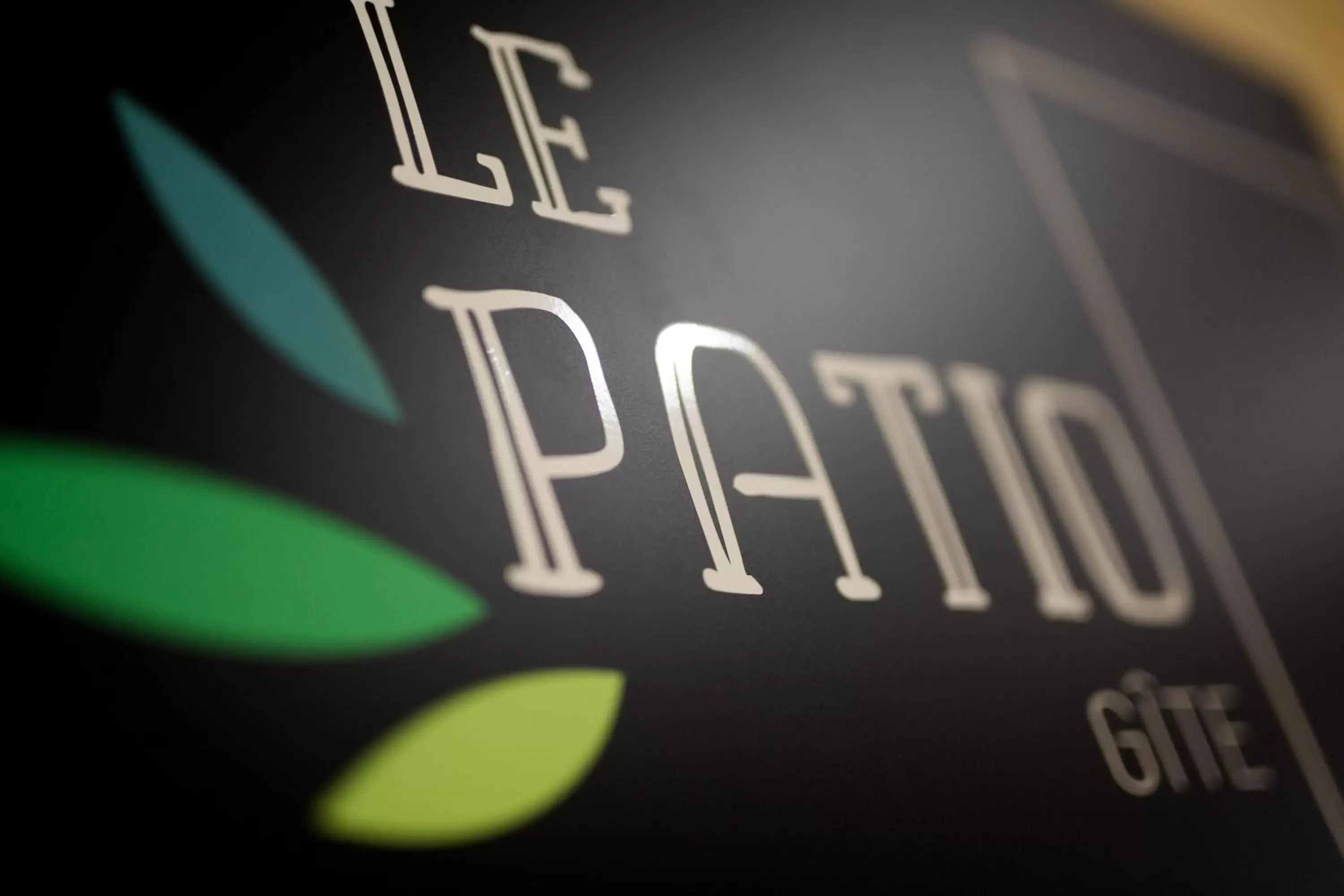 Property logo or sign in Le Patio