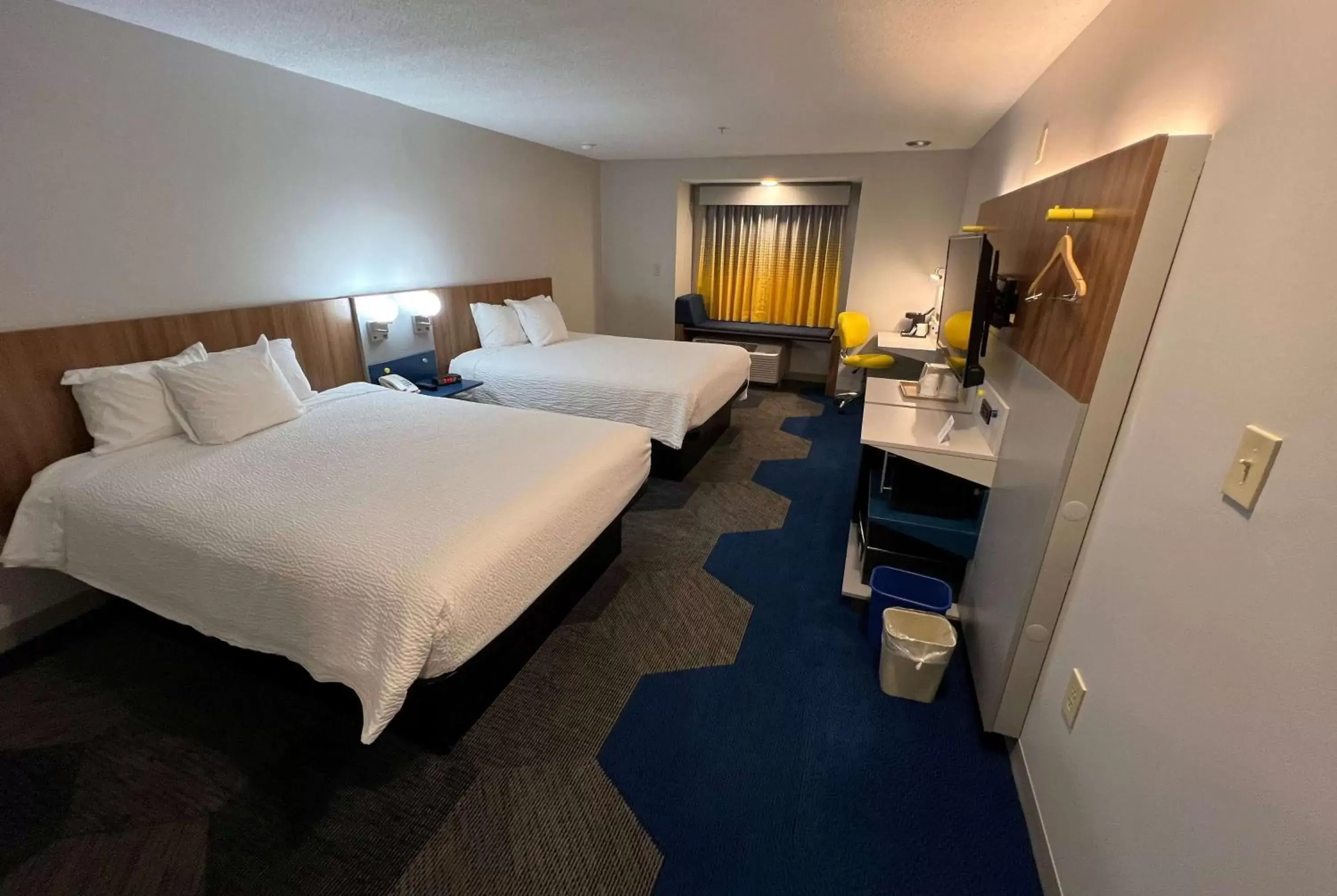 Bed in Microtel Inn & Suites by Wyndham Charlotte/Northlake