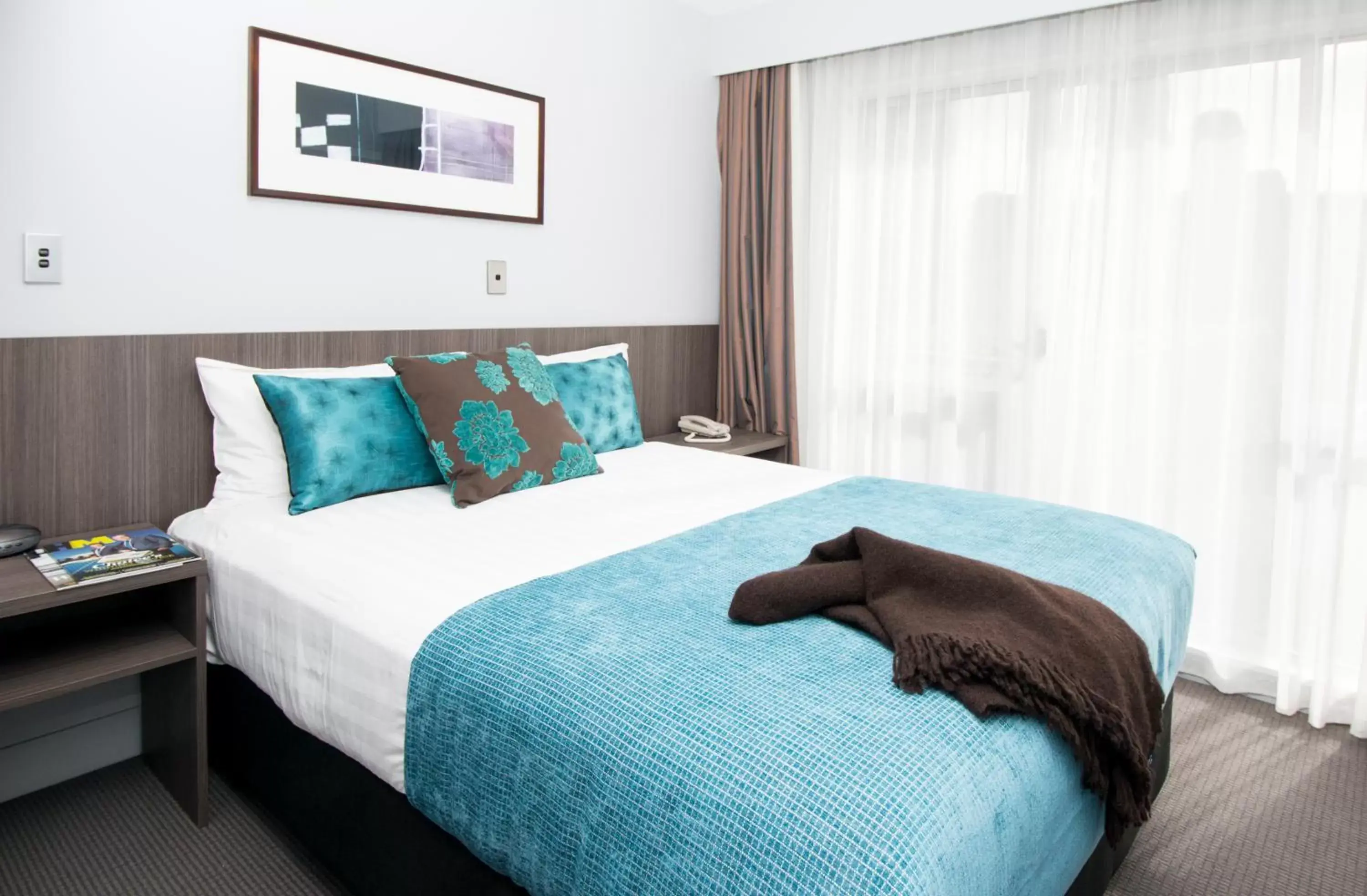 Bed in Quest Newmarket Serviced Apartments