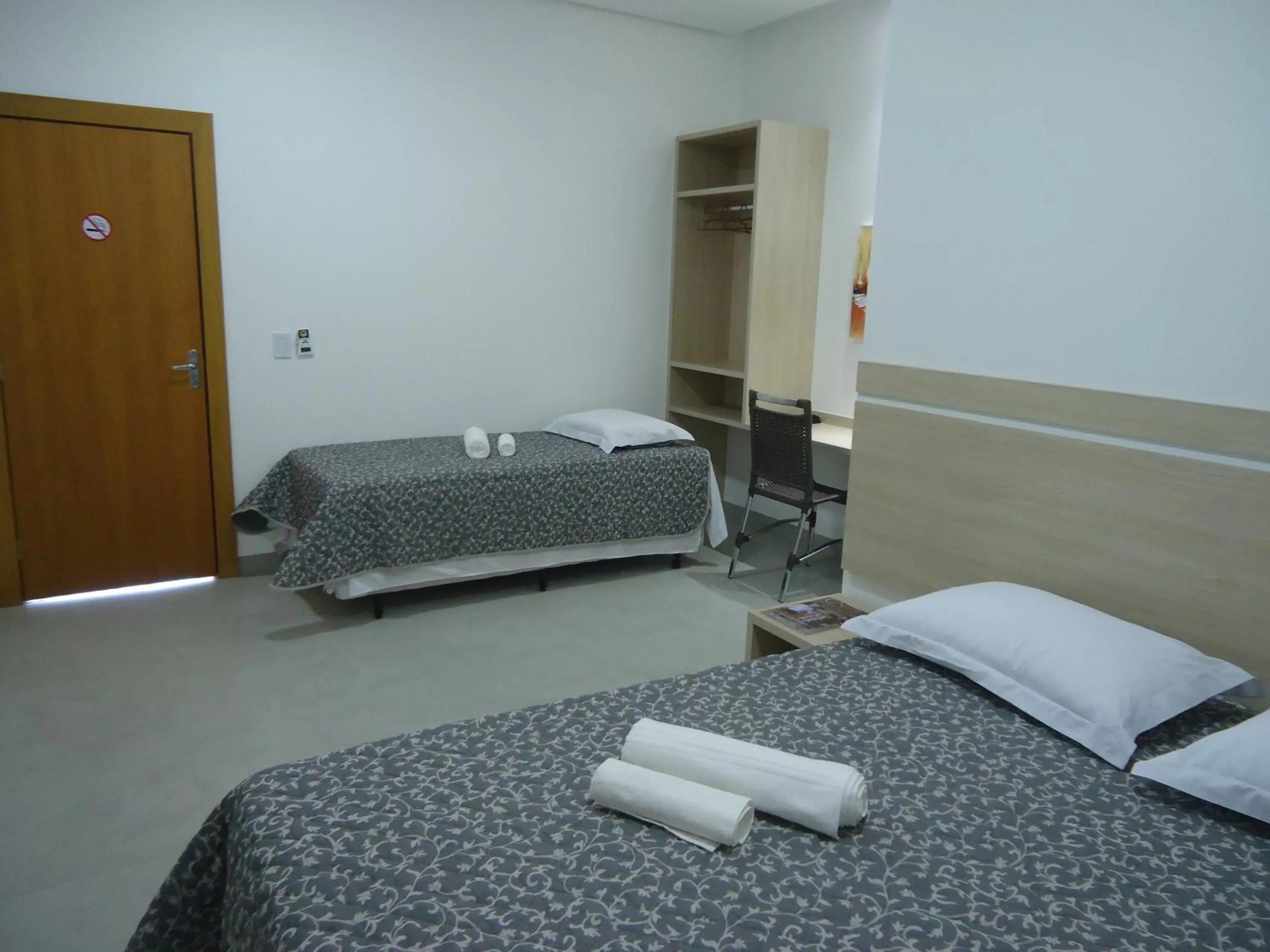 Photo of the whole room, Bed in Hotel Jequitibá