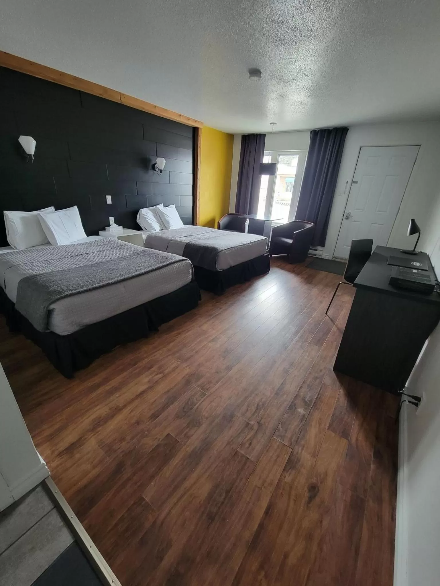 Bed in Motel Le Riviera