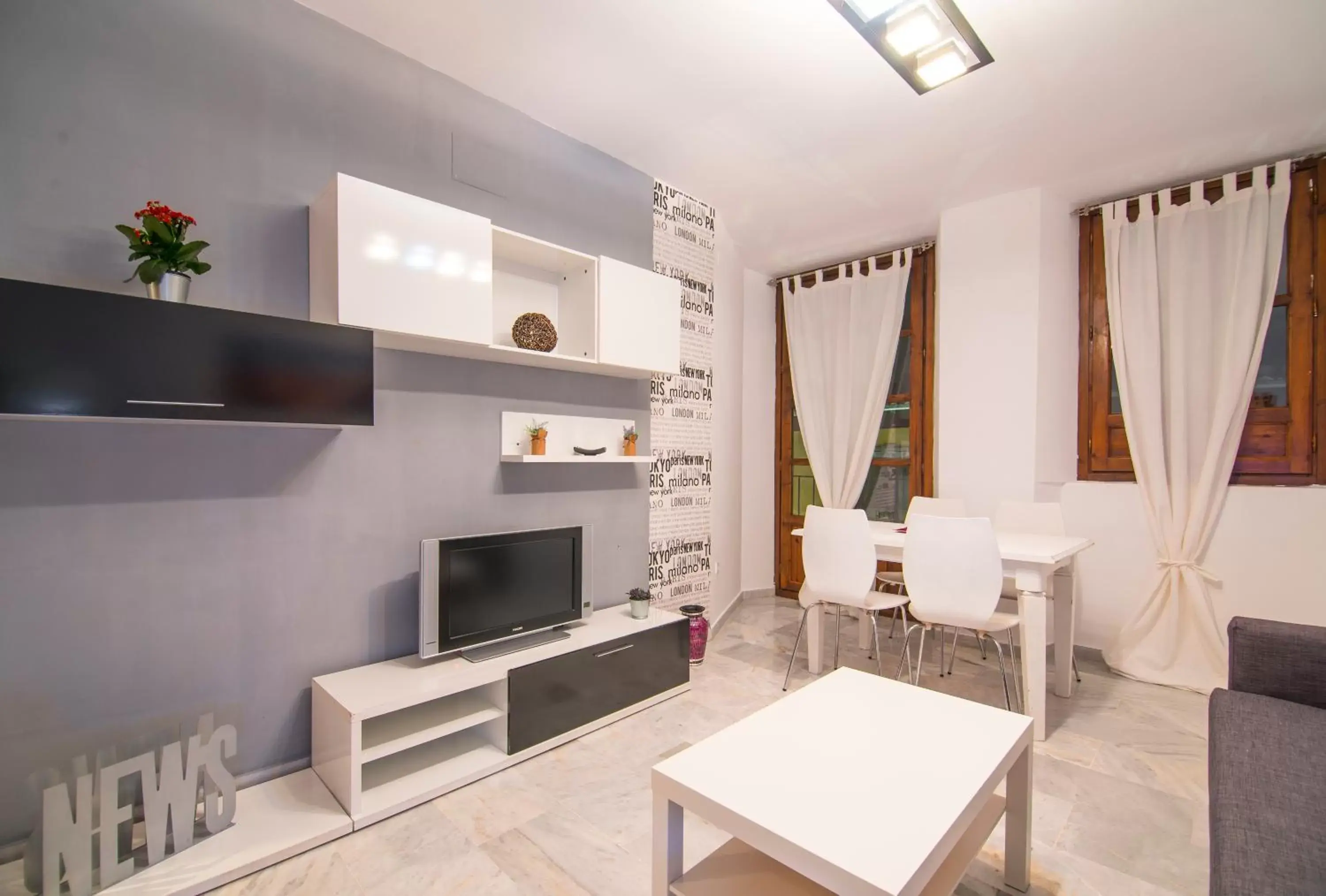 Seating area, TV/Entertainment Center in Apartamentos Granata