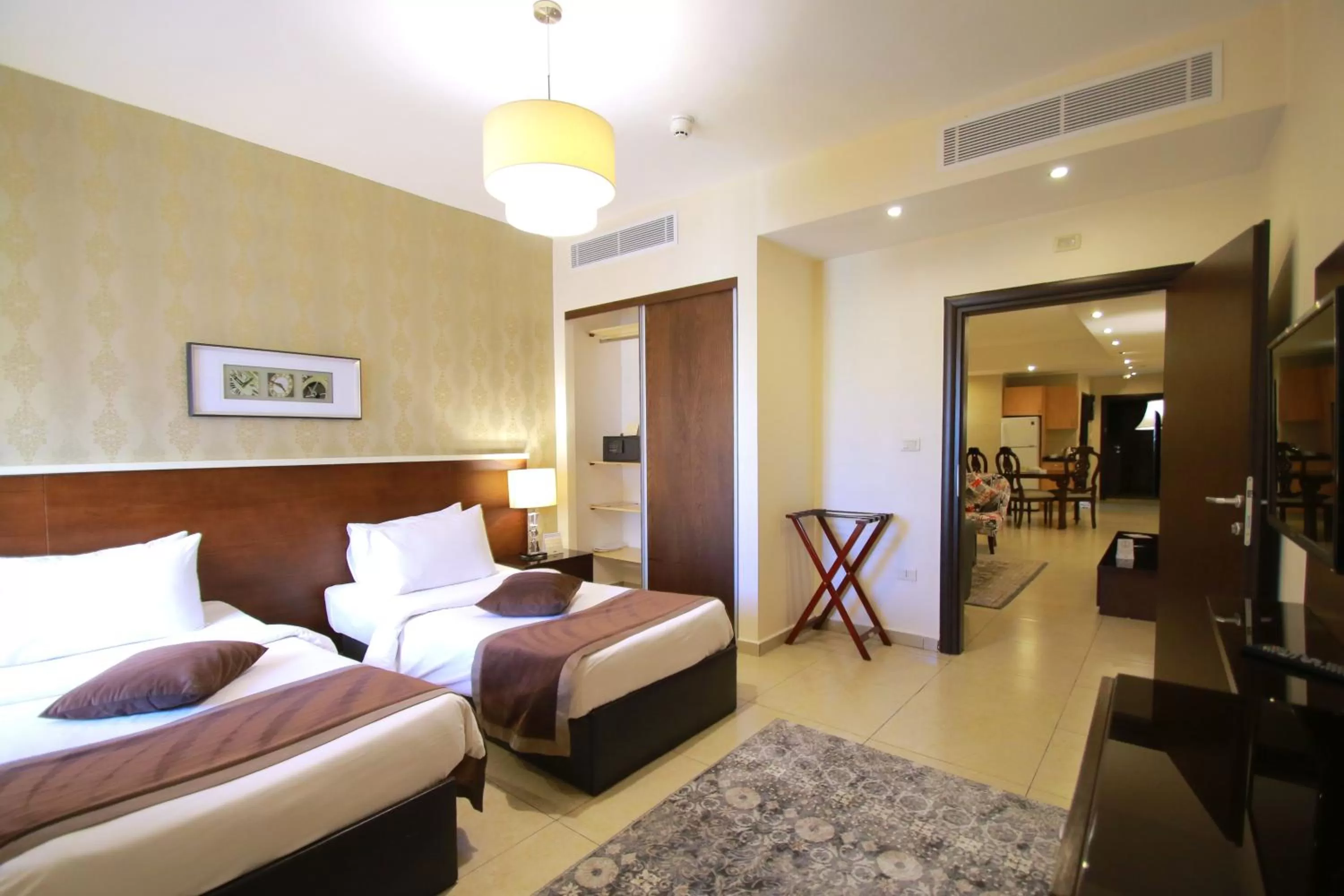 Bed in City Rose Hotel Suites