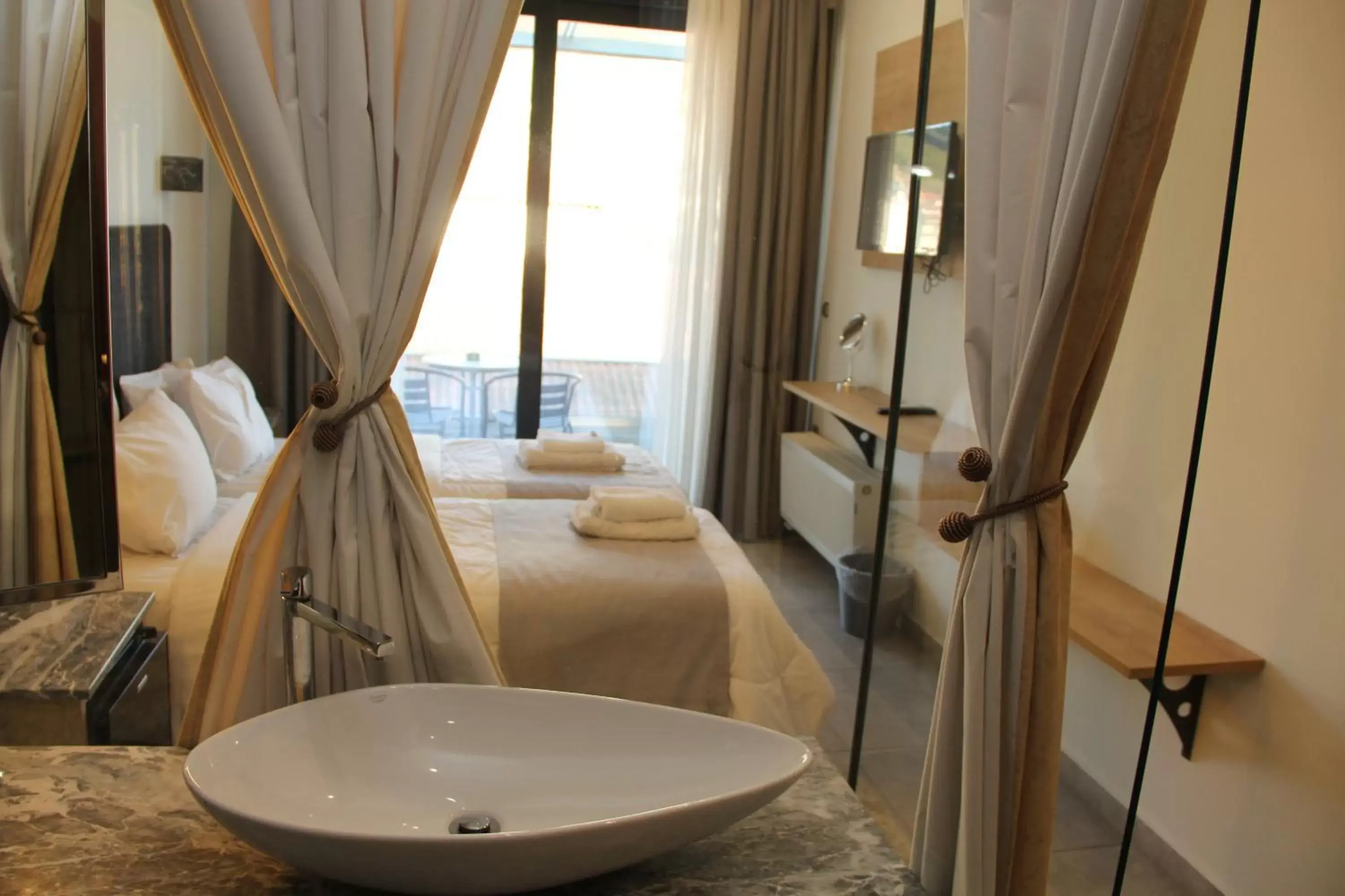Photo of the whole room, Bathroom in Alexiou Hotel