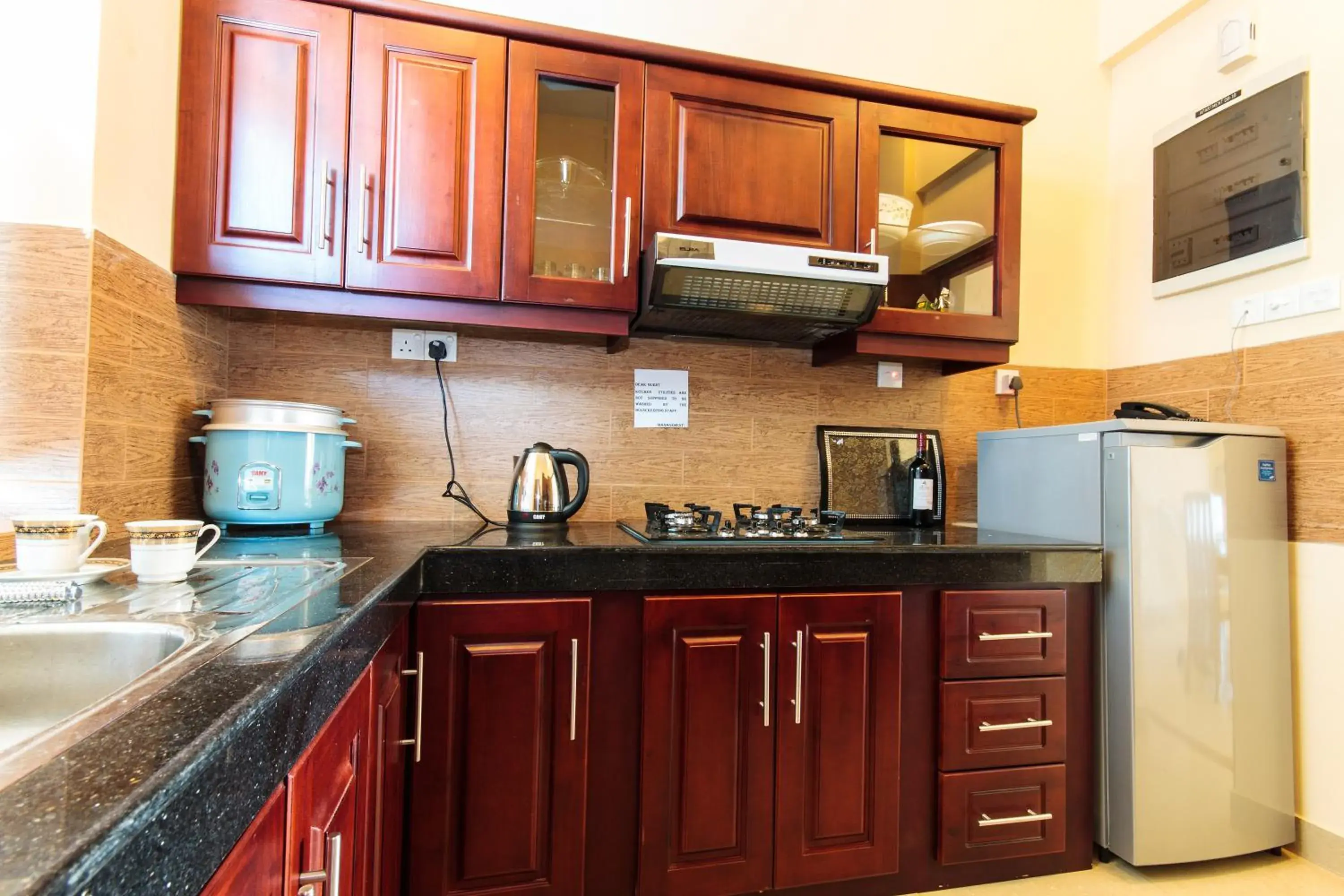 Kitchen or kitchenette in Supun Arcade Residency Kitchen or kitchenette in Supun Arcade Residency