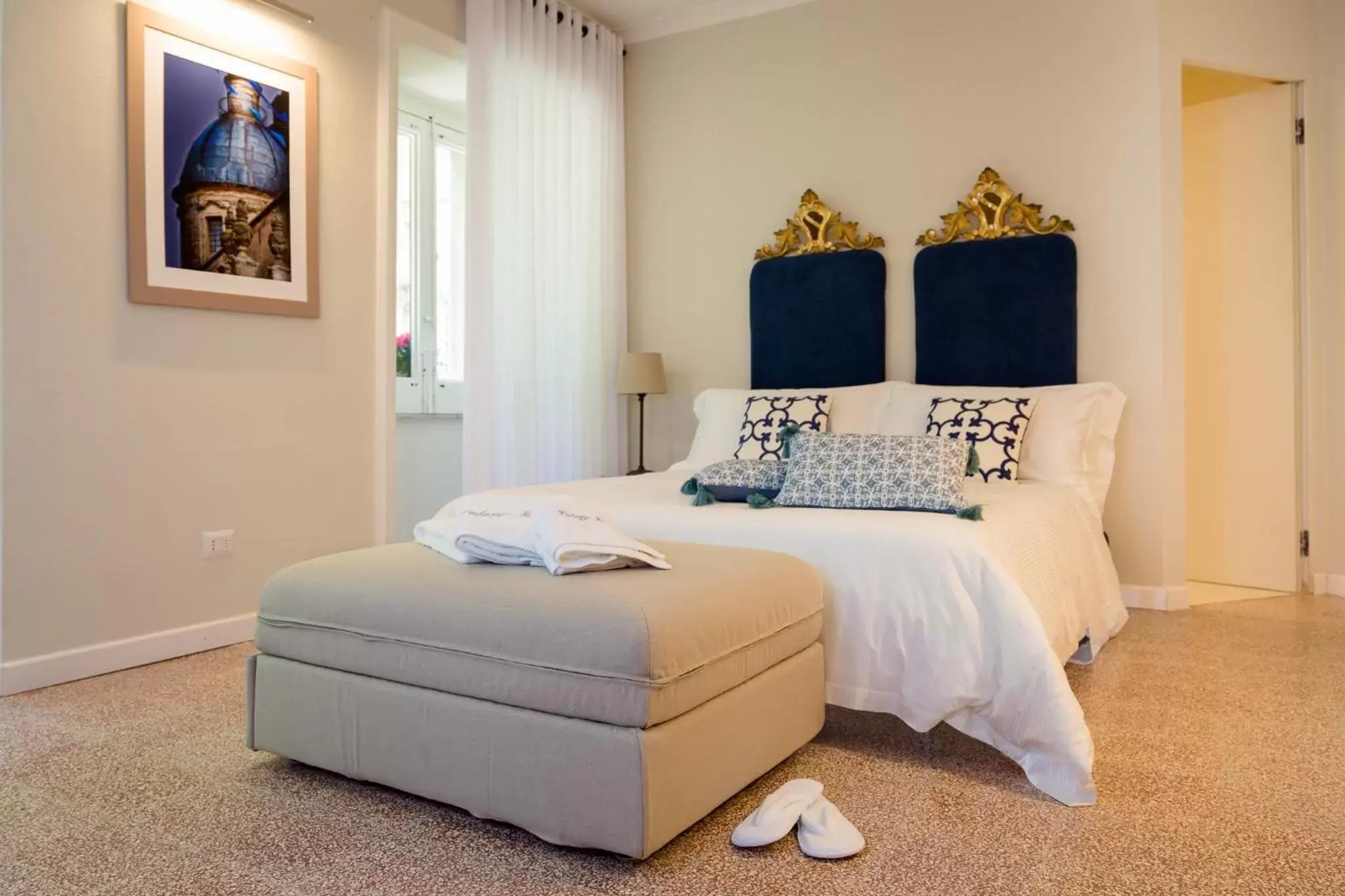 Bed in Palazzo Taranto Luxury Rooms
