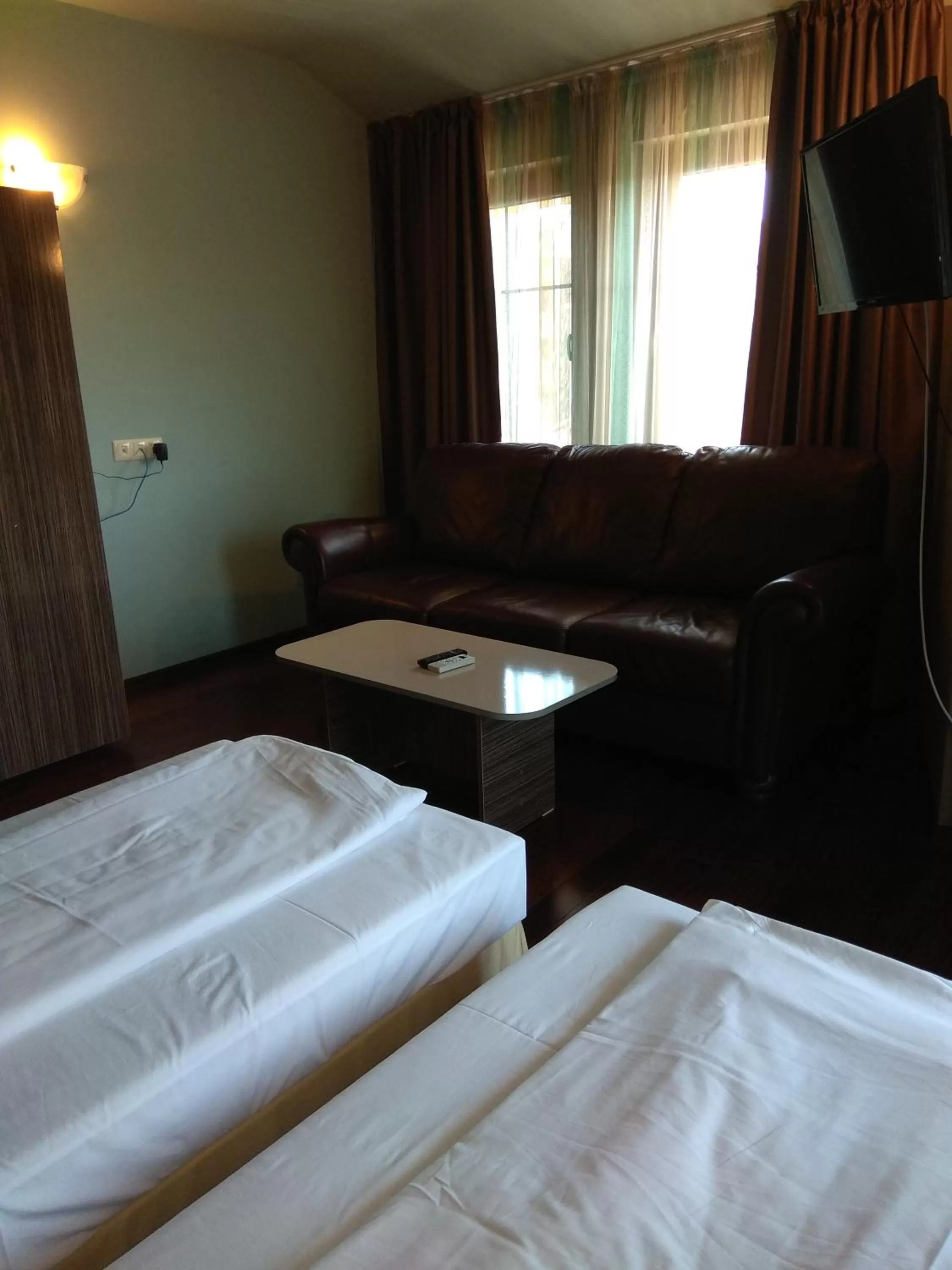 Bed in Roots Hotel and Wine Bar