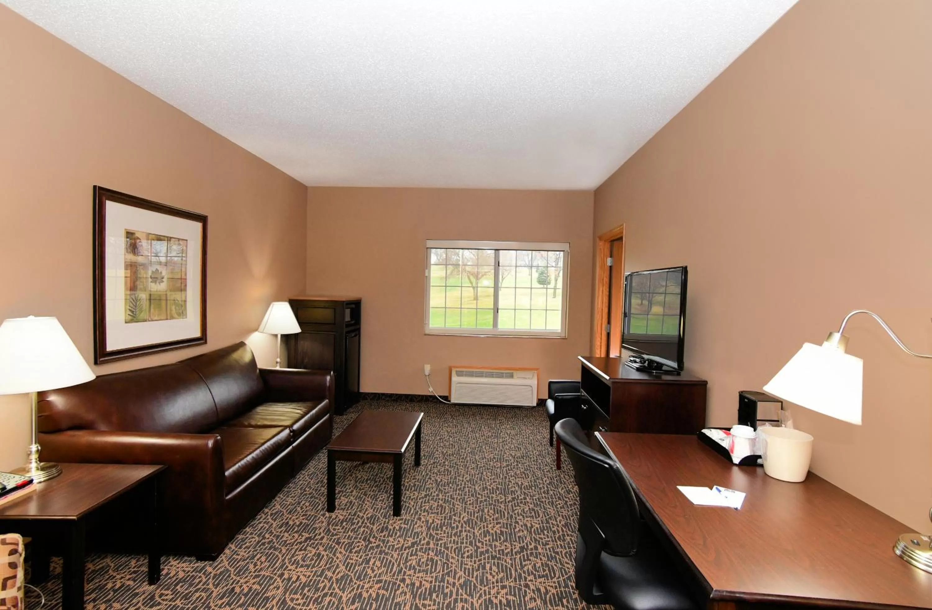 TV and multimedia in Cobblestone Inn & Suites - Denison | Majestic Hills