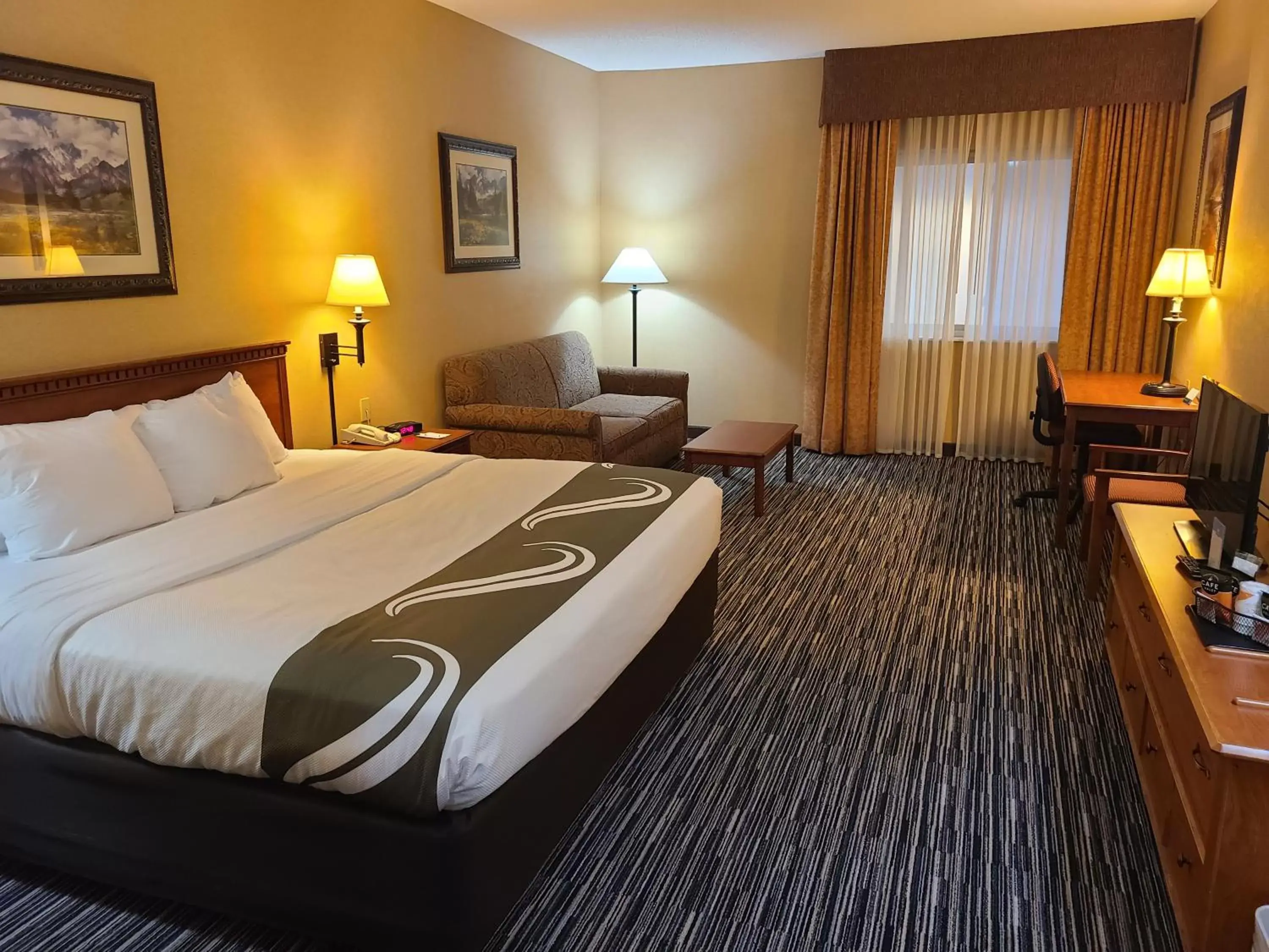 Bed in Quality Inn & Suites Wellington – Fort Collins