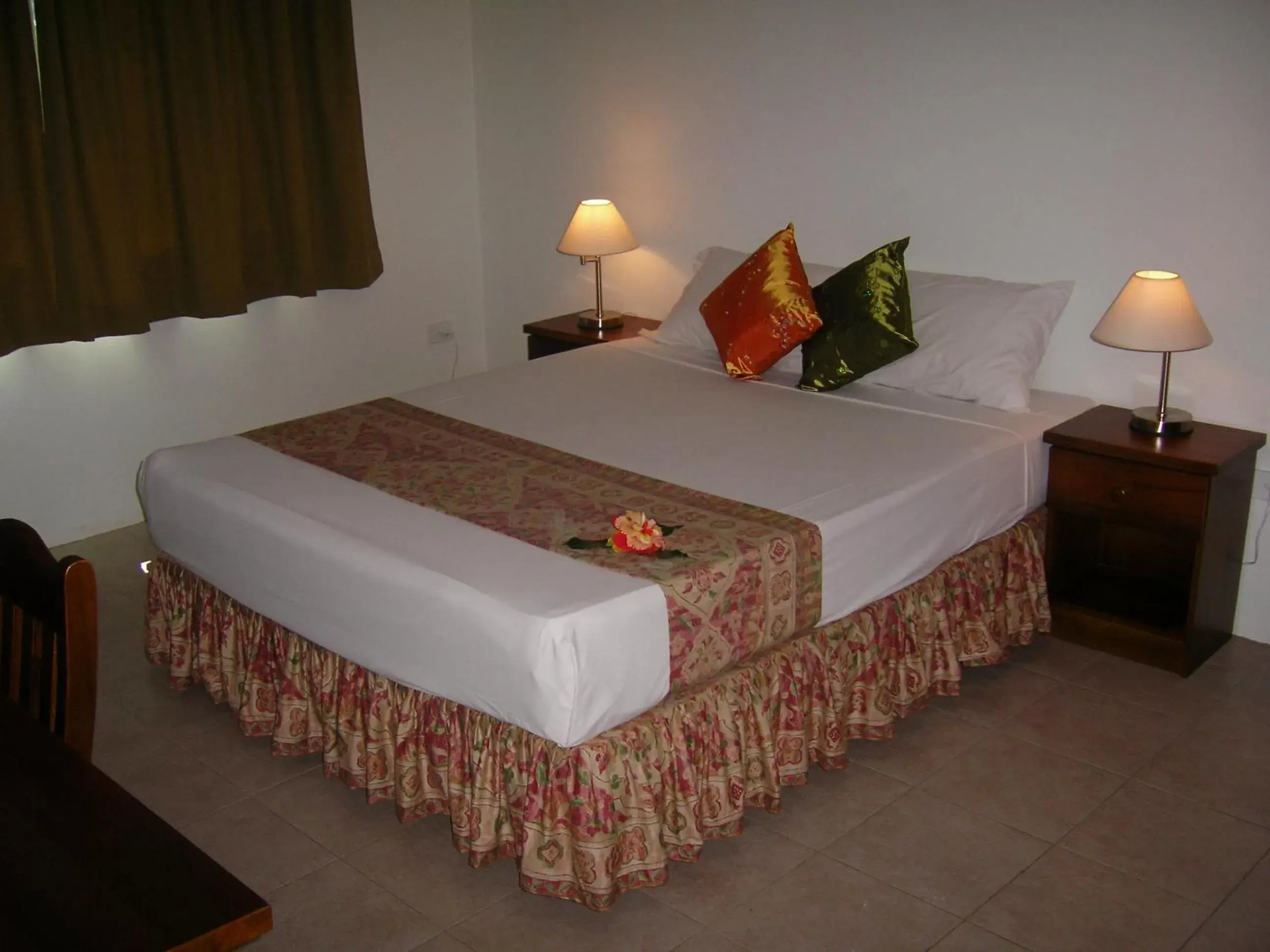 Bed in Hexagon International Hotel, Villas & Spa