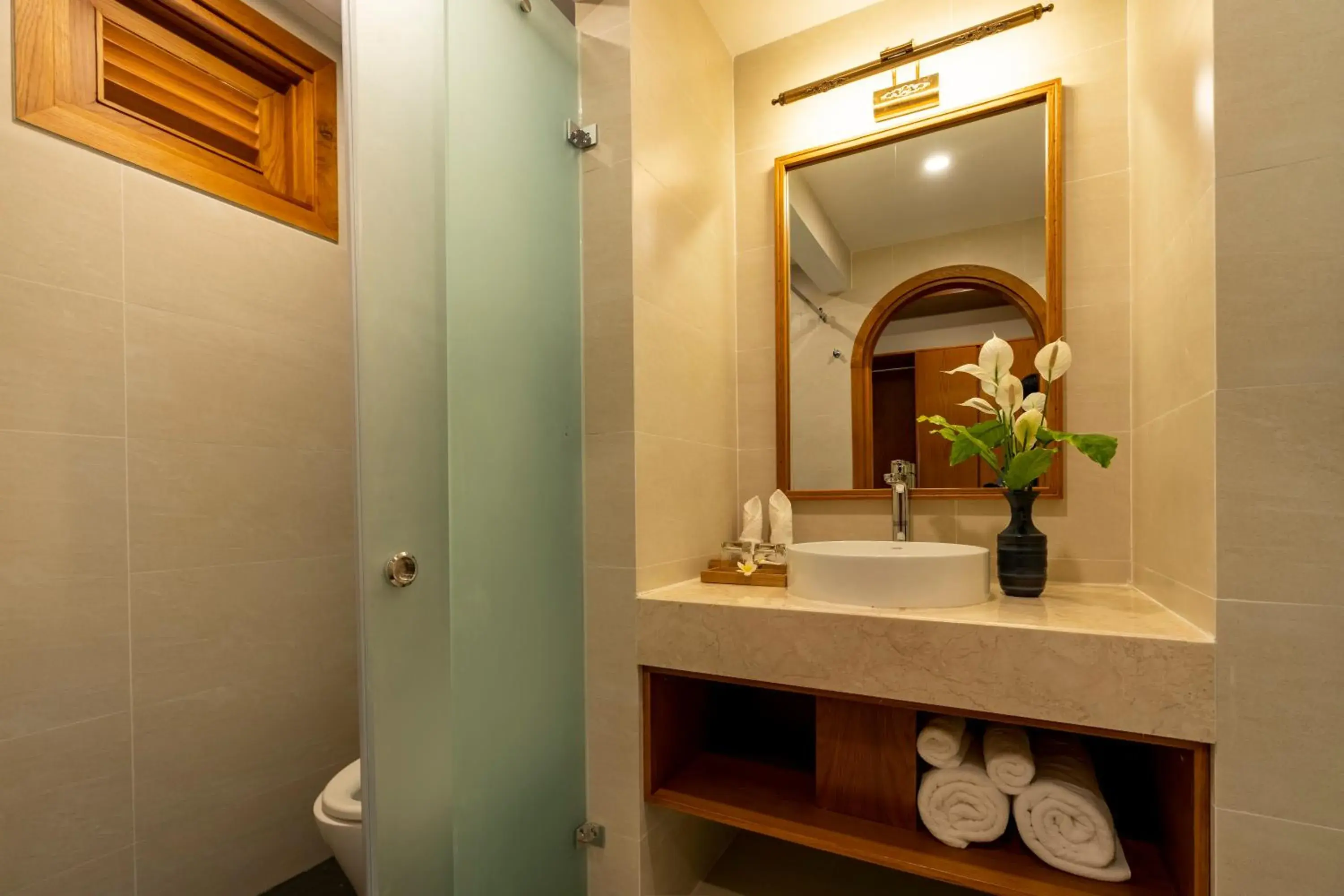 Bathroom in Aroma Beach Resort and Spa