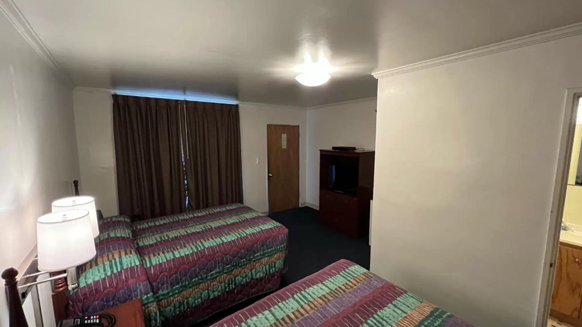 Bedroom, Bed in Four Oaks Lodging