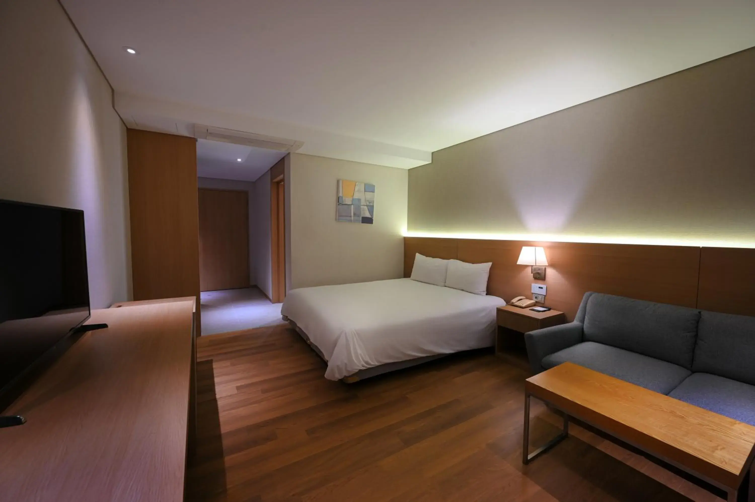Bed in Astar Hotel Jeju