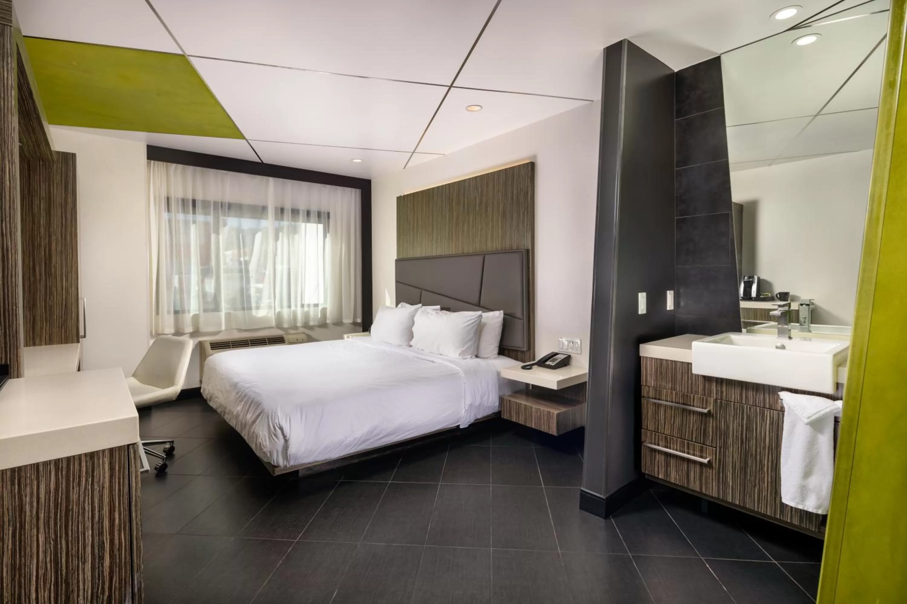 Photo of the whole room, Bed in The Moment Hotel