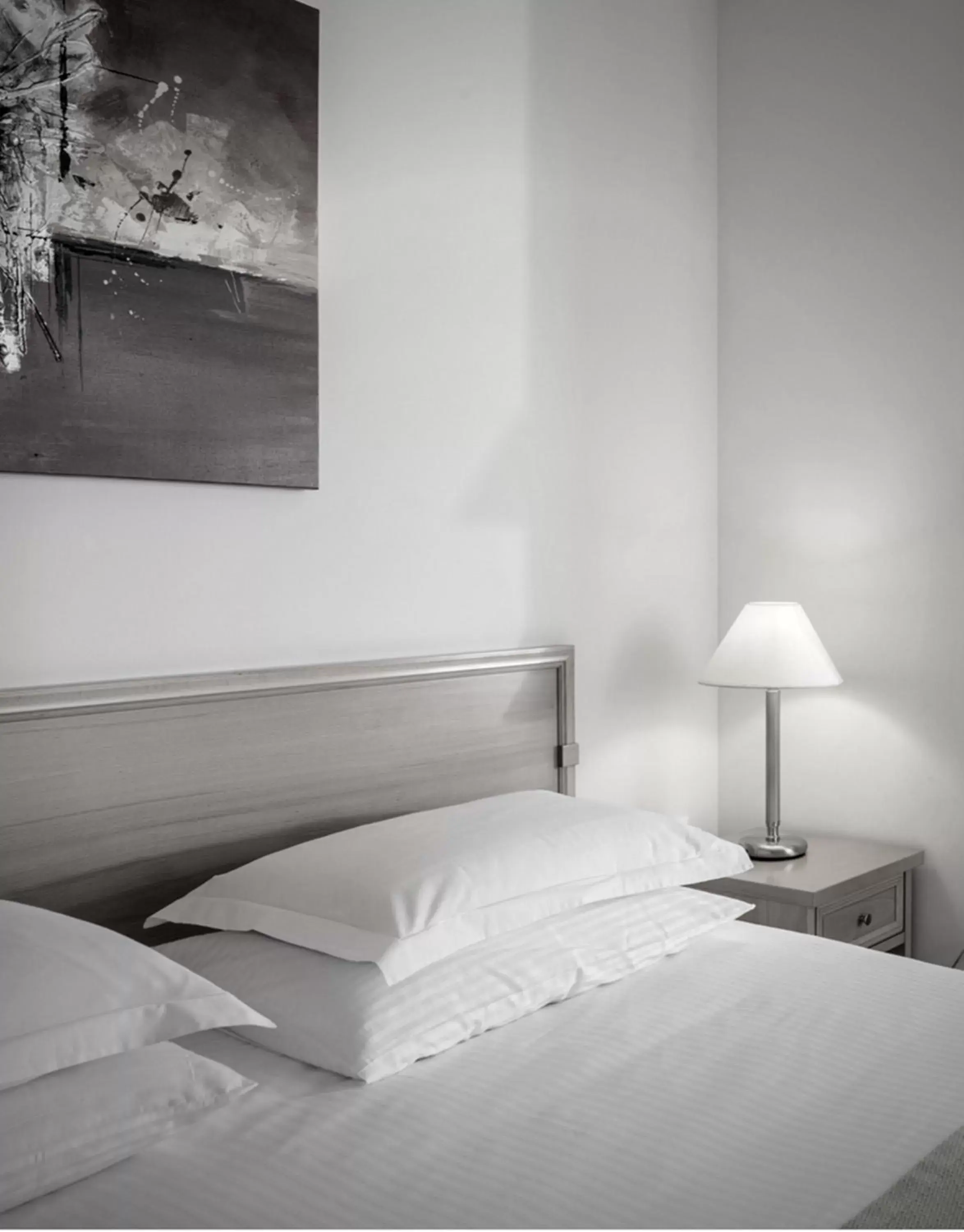 Bed in Civitel Attik Rooms & Suites