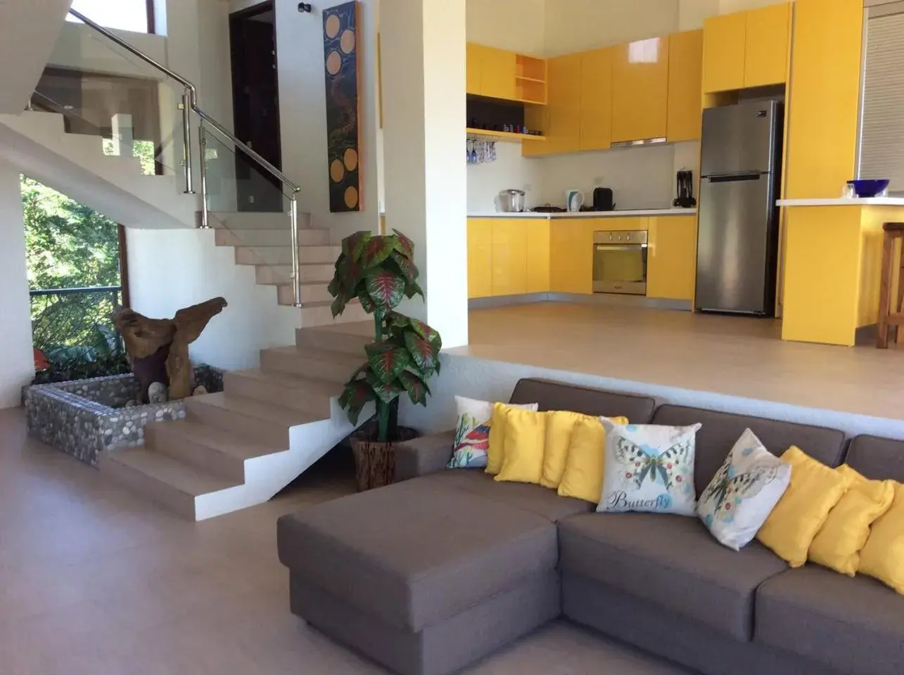 Kitchen or kitchenette, Seating Area in Sunset At Aninuan Beach Resort