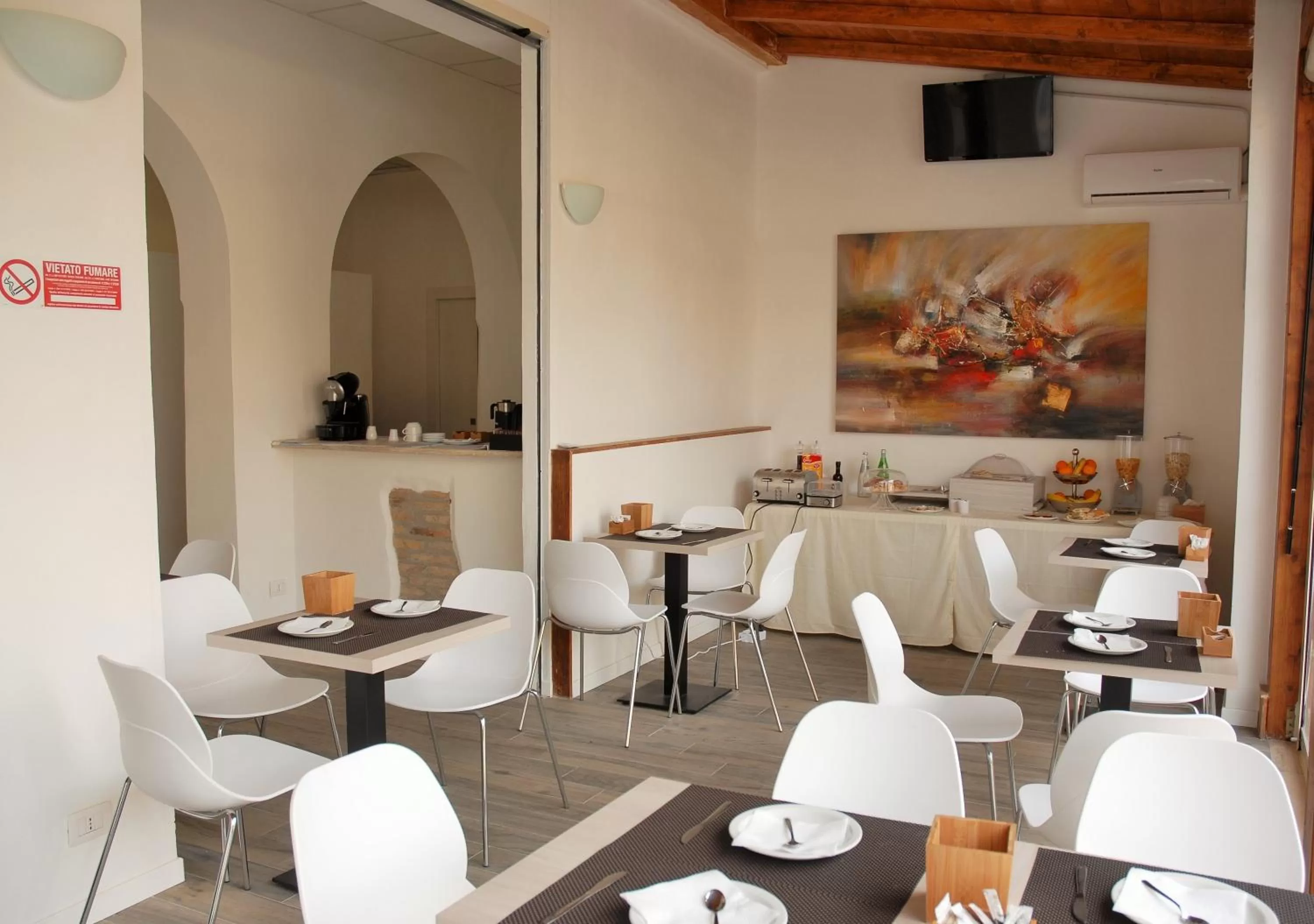 Communal lounge/ TV room in Academy Hotel